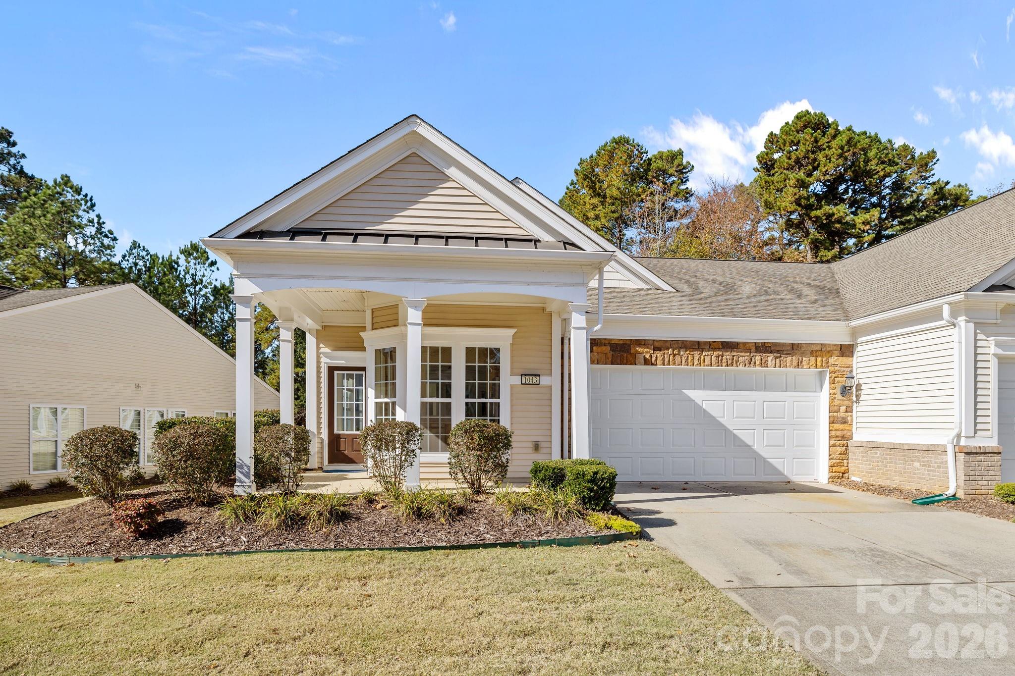 Lake Views From your back porch!!! All 2026 HOA fees will be paid by seller with an accepted offer.  Enjoy the best of active adult living in this beautifully updated 2-bedroom, 2-bathroom townhome located in the highly sought-after Del Webb community of Sun City Carolina Lakes. Perfectly positioned overlooking one of the community’s picturesque lakes, this home offers peaceful water views and a low-maintenance lifestyle just steps from world-class amenities. Inside, you’ll find freshly updated paint, brand-new carpeting, and luxury blinds throughout, creating a bright and inviting atmosphere. The kitchen features modern appliances and flows effortlessly into the open-concept living and dining area—perfect for entertaining or relaxing with friends.
Step out onto your private back porch to enjoy your morning coffee or evening sunsets overlooking the lake. Both bedrooms are generously sized, with the primary suite offering a full bath and plenty of closet space.
Located just a short walk from the community clubhouse, fitness center, pools, and walking trails, this home offers the ideal blend of convenience and tranquility. Plus, you’re just minutes from Harris Teeter, restaurants, and shopping, making everyday living a breeze.
