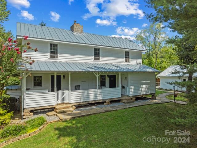 Experience the perfect blend of country living and convenience at the historic John A. Lanning House, built before 1839. Nestled in the peaceful landscape of Buncombe County, this charming home offers the tranquility of rural life while being just 15 minutes from downtown Asheville, 10 minutes from the Blue Ridge Parkway, and 20 minutes from Asheville Regional Airport. Meticulously restored after a fire in 2007, the home retains its original saddlebag layout, dovetail cornering, and yellow pine construction. Details like reclaimed wood floors and salvaged hinges add character. The house weathered Hurricane Helene without damage, standing strong as a testament to its quality. Own a piece of history reimagined for modern living, offering peace with easy access to everything Western North Carolina has to offer! Please note: The sauna is not included. Seller is offering $3K to help with a rate buy-down.







(