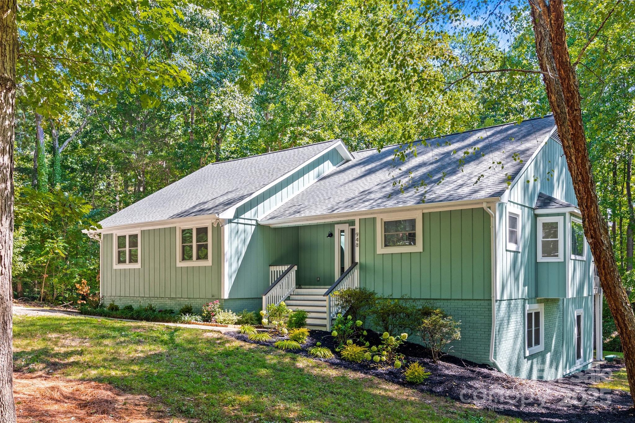 Tucked into a quiet, well-established neighborhood just minutes from Rock Hill’s most beloved parks and lakefronts, 948 Kingswood Drive is a rare gem that offers more than just a place to live - it offers room to grow, adapt, and thrive.

Fully renovated from top to bottom, this spacious 4-bedroom, 3-bathroom ranch-style home with a finished walk-out basement is a showcase of thoughtful design and versatile living. Whether you're looking for a private space for extended family, an independent setup for guests, or an income-producing rental opportunity, this home delivers with a full basement suite complete with its own entrance, living space, bathroom, and office/bonus space.

On the main level, you're welcomed into a bright, refreshed living area where luxury vinyl plank flooring, recessed lighting, and modern finishes set a polished tone. The updated kitchen features sleek, tasteful cabinetry with ample storage, new countertops, double-ovens, a work-station sink, and more -  making everyday meals and weekend entertaining equally enjoyable.

The primary suite offers a serene retreat with its own en-suite bathroom, stunning tile, smart mirrors, and a custom built-in closet. Down the hall, two additional bedrooms and a full guest bath provide comfort and flexibility for the whole family.

The basement level is fully finished and ready for multigenerational living, Airbnb hosting, or even a home-based business. With its separate entry, the space includes a spacious living area, a large bedroom, full bath, and room for a kitchenette setup.  

Additionally, the enormous unfinished walk-in attic space gives even more potential for growth, equity building, and customization.

And did we mention? There’s no HOA, which means you can truly live on your terms at home - park your boat or create the garden of your dreams - no annoying paperwork or approval necessary.

Located just a short drive from Lake Wylie, Downtown Rock Hill, and I-77, this home offers the rare combination of peaceful suburban living and excellent connectivity. Whether you're seeking space to grow a family, support aging parents, or generate rental income, 948 Kingswood Drive is a home that adapts to your lifestyle - today and tomorrow.

Homes this flexible, this modern, and this well-located don’t come along every day.