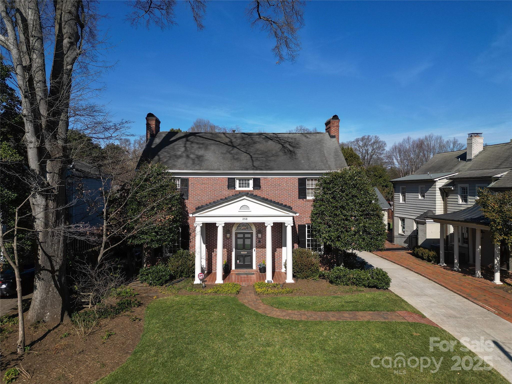 Stately brick home in highly desirable Eastover embodies the timeless charm and character of a classic Charlotte home. Nestled on picturesque Fenton Place, with 9.5-foot ceilings, generously sized, light-filled rooms, and an inviting floor plan easy for everyday living, great flow for entertaining. Upstairs there are four graciously sized bedrooms and three bathrooms. Thoughtful built-ins and custom storage is found throughout the home, along with a covered back porch perfect for relaxing or gathering with friends. This home offers a true in-town lifestyle—just moments from The Mint Museum, shops, dining, parks, and more, with easy commute to Uptown. A detached garage features a spacious bonus room above, already plumbed for a bathroom, providing endless possibilities for additional living spaces. A rare opportunity to own in one of Charlotte’s most prestigious neighborhoods!