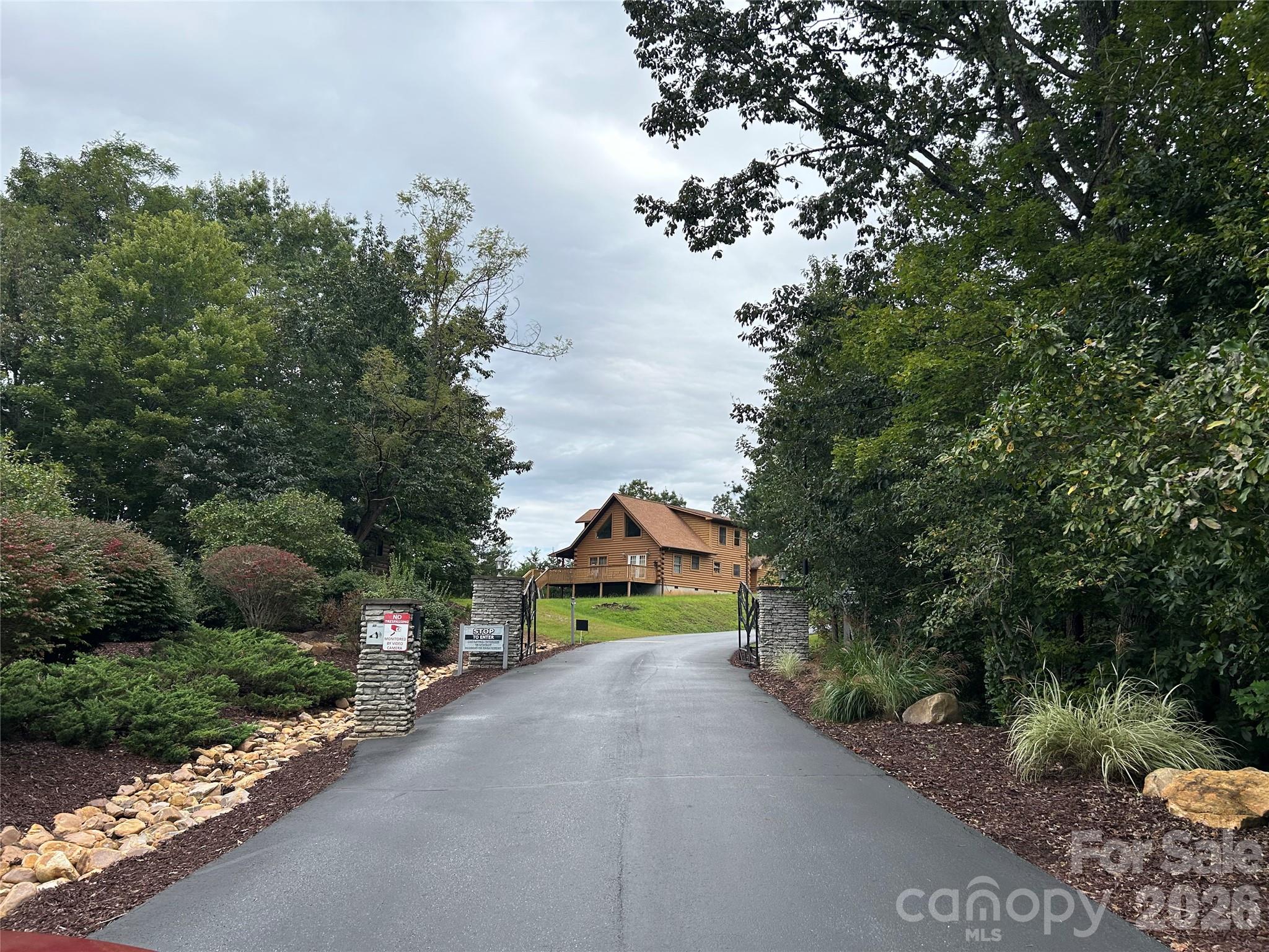 Welcome to Beautiful South Mountain Peaks in Rutherford County North Carolina!! This 3.77 acre lot is ready for you to build your dream home.  This gated community has many amazing homes and also maintains the private and rustic feel. There is still a lot of land available and so much wildlife.  This lot is located closer to the gated entrance, so it is not high up the mountain.  It is located on a quiet road and is on the cul-de-sac. Much of the land is sloped and wooded but there is a building spot that ready for you to build on!  South Mountain Peaks is located in Golden Vailley, NC and is a gated community. You are just a very short distance from the Yogi Bear Jellystone Park.  Call today for a showing or a virtual tour!!