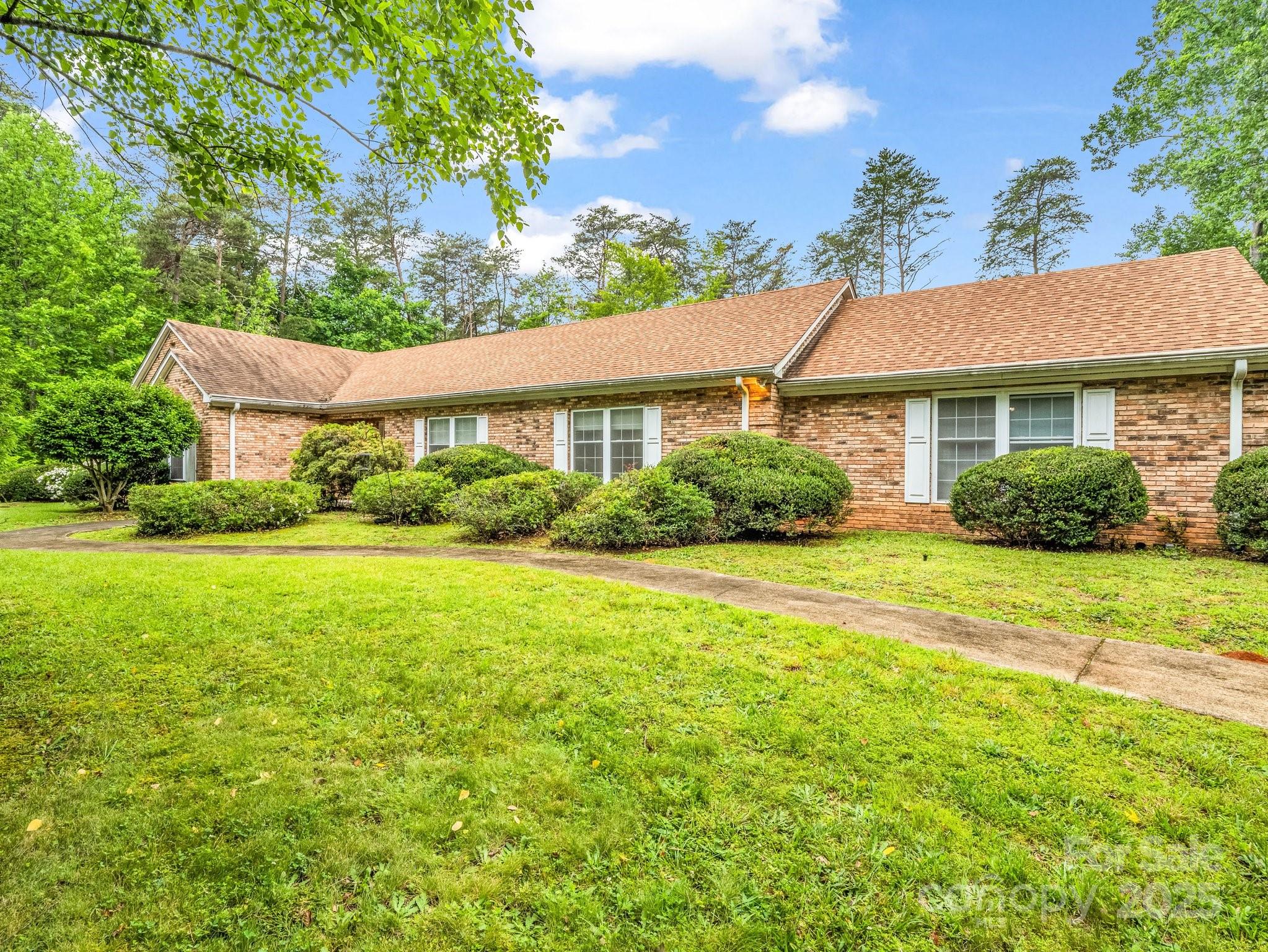 Presenting a fabulous one level 4-Bedroom Home on Over an Acre!

This spacious and well-designed 4-bedroom, 2.5-bath home offers comfortable living in a serene, treed setting. Inside, you'll find a generous floor plan with multiple living areas including a bright and airy living room and formal dining room—both featuring large windows that fill the space with natural light.

The open-concept kitchen flows seamlessly into the breakfast area and large den, making it ideal for everyday living and entertaining. The home's solid brick exterior is complemented by mature landscaping that provides privacy and charm on the 1+ acre lot.

Enjoy the spacious backyard, ready for your personal touch—perfect for creating your own outdoor oasis. With just a few cosmetic updates, this solid home is a wonderful opportunity to customize and make your own.

Don’t miss this chance to own a beautiful property in a peaceful, private setting!

This is an Estate sale and home is being sold  "As Is."