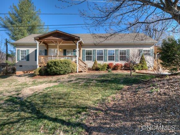 Spacious 2 Bedrooom home with bonus room located on private lot easily accessible to Asheville, Tunnel Road, VA and I-40.  Kitchen boasts large island, large pantry & eat in kitchen.  Split bedroom plan with large master bath and walk in closet. Gas log fireplace in living room and open dining and living room floor plan. USDA qualified home.  Home has a 2 car carport and storage shed.