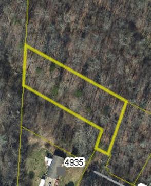 Land Lot suitable for Doublewide, Modular, and Site built homes. County water available, septic needed. Light restrictions, includes dwelling minimum 1100sq ft.