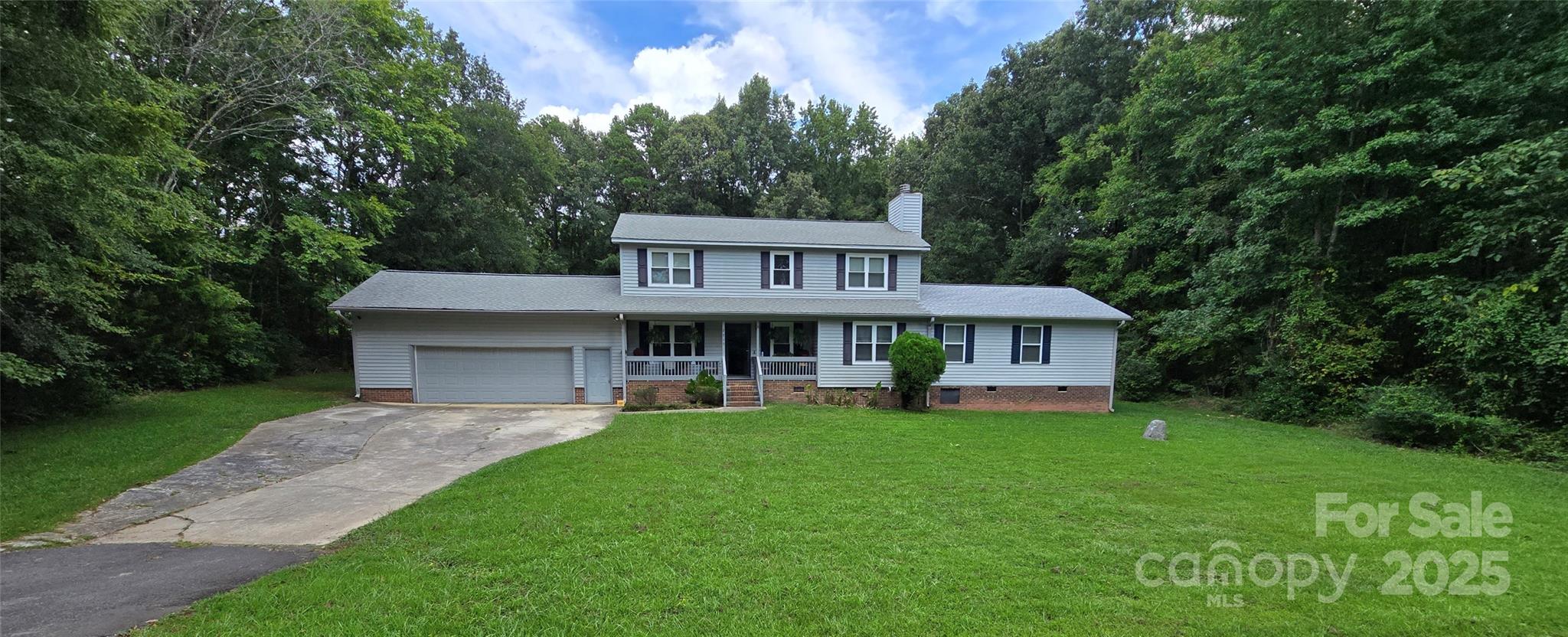 OPEN HOUSE THIS SUNDAY MAY 17th 1pm-4pm Come stop by and check out this wonderful property. This unique home boasts two separate primary suites, each with its own private en-suite bathroom, one located on each of the home's two levels. The upstairs primary suite offers a private covered porch, while the home's most recent upgrade in 2022 adding a stunning new primary suite on the main level with a walk-in shower and a luxurious jetted tub. Situated on a desirable corner lot with over 1.5 acres, this property is the perfect canvas for a growing family. With plenty of room to spread out in 4-bedroom, 3.5-bathroom home, with large family room, laundry, dinning area, and attached 2-car garage with large driveway. 

With strong bones and no HOA, this is an incredible opportunity to breathe new life into a home in a peaceful neighborhood that is experiencing renewed vibrancy. Sitting less then a 10 minute drive from Rock Hill Galleria Mall and Interstate 77. Outdoor living is a highlight, from the extended back deck perfect for entertaining to the welcoming covered porch at the front of the house. Don't miss the chance to own a piece of prime real estate with endless potential.