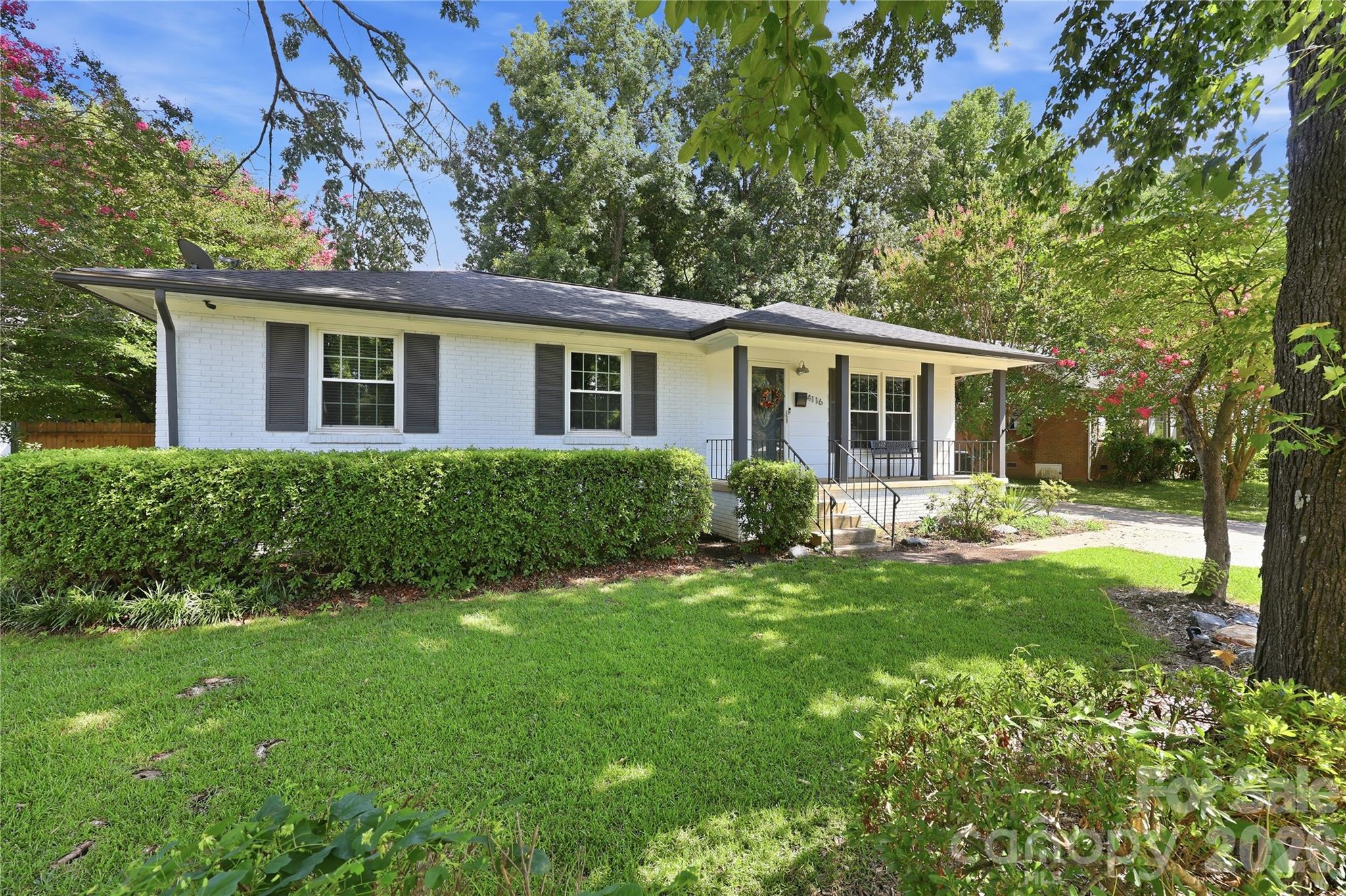 Welcome home to this thoughtfully renovated Shannon Park gem, where classic charm meets modern style. Every detail has been carefully updated, creating a move-in-ready home that’s as inviting as it is functional.
Inside, you’ll find beautifully refinished hardwood floors in the bedrooms and new luxury vinyl plank flooring throughout the main living areas. The stunning kitchen is the heart of the home, featuring sleek quartz countertops, brand-new cabinetry, and contemporary finishes that are perfect for both everyday living and entertaining. The bathrooms have been tastefully remodeled with quartz vanities and elegant Piedrafina shower surrounds for a clean, sophisticated look. Gather around the cozy wood-burning fireplace in the spacious family room or step through the new glass door to enjoy your own private backyard retreat. Surrounded by mature landscaping, the expansive patio offers the perfect setting for weekend cookouts, morning coffee, or evenings with friends and family. The oversized laundry room includes a washer and dryer, adding even more convenience to this turnkey property. Located just minutes from NoDa, Plaza Midwood, and Uptown Charlotte, you’ll enjoy quick access to some of the city’s best restaurants, breweries, shopping, parks, and entertainment while coming home to the quiet charm of the established Shannon Park neighborhood. Don’t miss this exceptional opportunity to own a beautifully updated home in one of Charlotte’s most convenient locations. Schedule your private showing today!