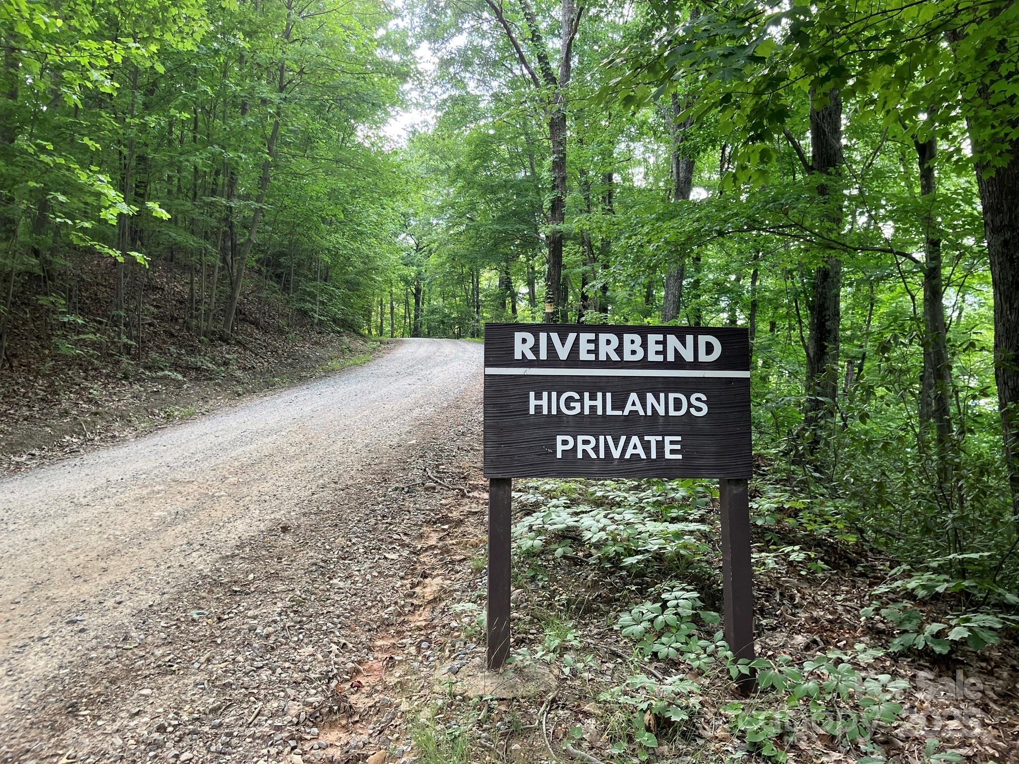 PRICE REDUCED! 2.95 acre lot in Riverbend Highlands, Lake Lure, Rutherford County. Ideal for a peaceful full-time residence or mountain getaway. Low $450/yr POA fee for road maintenance. Minimum home size is 1,000 sq ft—manufactured homes not permitted. Enjoy fresh mountain air, abundant wildlife, and miles of private roads for walking and nature watching. Just minutes to Lake Lure, golf, shopping, and dining. Outdoor activities abound—kayaking, fishing, hiking, ziplining, and more! Lot 429 on Roberts Trail is gently sloping, and the lightly wooded lot offers potential for stunning mountain views with selective tree clearing; winter views already available. Rumbling Bald Resort with 2 golf courses, pools, and tennis is a short drive away. Experience tranquility, nature, and mountain living at its best!