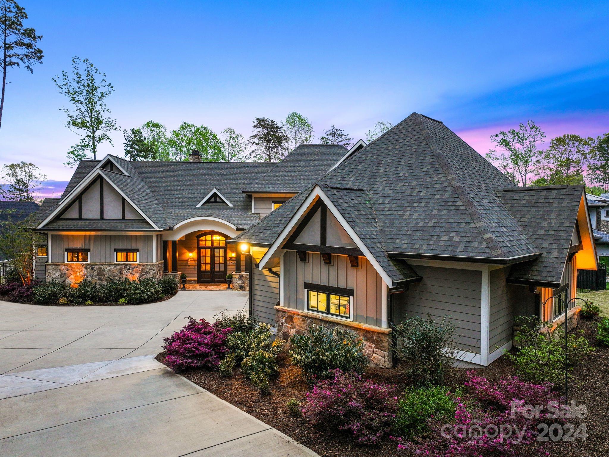 Passing through the gates of Webbs Chapel Cove brings you to a private and secluded Lake Norman waterfront home, tucked away on over 2 undisturbed acres. Commissioned in 2019 the sellers worked with locally sought after architect Kevin Holdenridge of KDH Design on a vision to create a "Rustic Mountain Lake House". The vision came to life with the help of the award winning builder, Artisan Custom Homes. The fully automated custom home includes many interior and exterior features that blend perfectly for entertaining in style. The thought after design cultivates a luxury lifestyle that is unrivaled. Whether your desires take you out on the lake from your private dock or weekends at home sitting fireside enjoying the private amenities, there is plenty to love! Webbs Chapel Cove is just a short drive to nearby stores, restaurants and shops or boat to many different waterfront restaurants or popular Lake Norman destinations. Your private resort awaits!