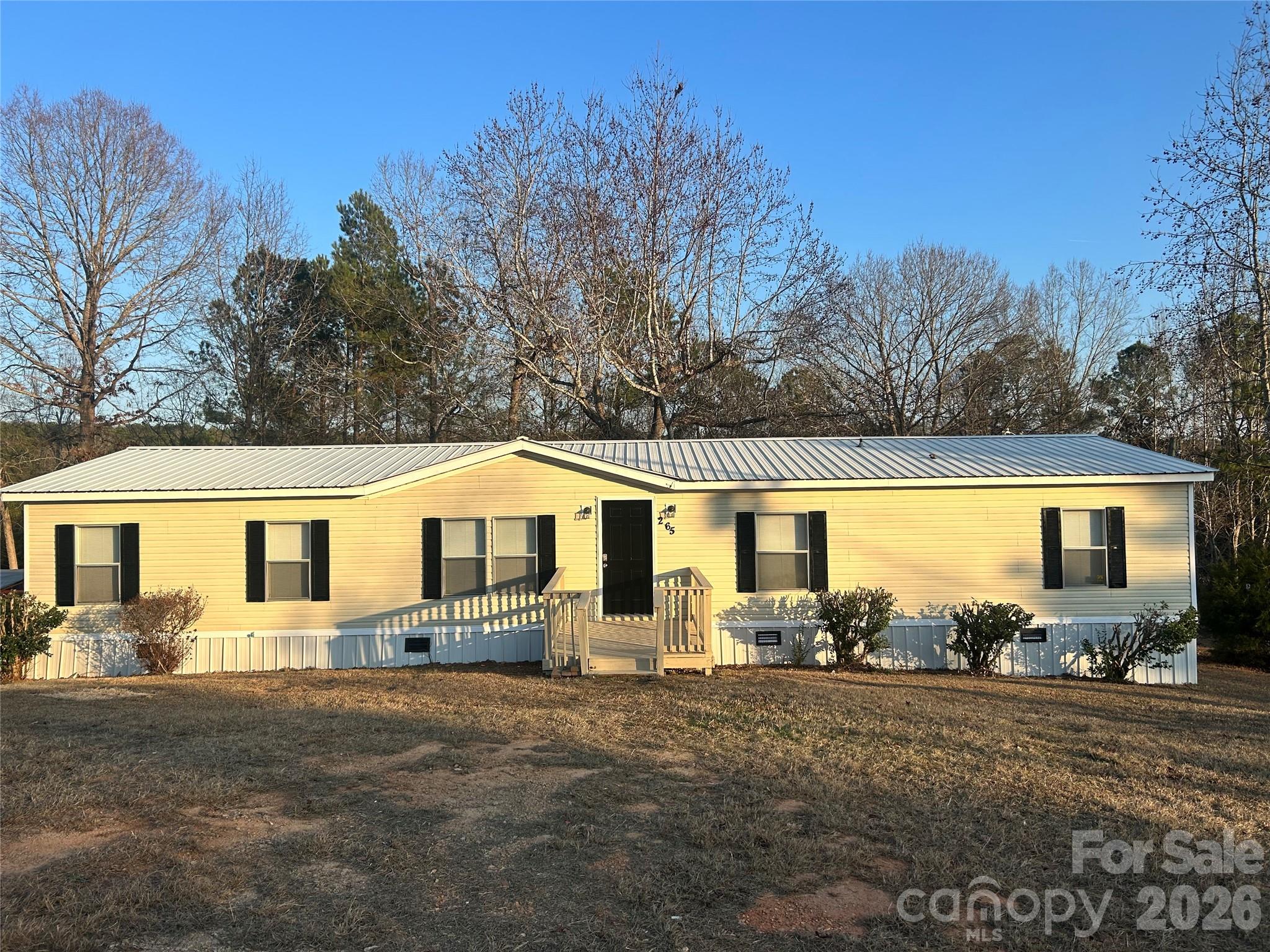 Beautiful single-family home with 1.34 acres of land located in Columbia SC. Home consists of four spacious bedrooms with two full baths and lots of natural light throughout. Primary bedroom has lots of space with a large walk in closet and primary bathroom. There are three additional bedrooms with nice size walk in closets. Home also consists of two spacious living-room with an open floor plan. Kitchen has an open concept with lots of cabinet space. Dining-room is spacious as well with lots of room for entertaining. If you are looking for a single-family home with land, then look no further. This home will not last for long.