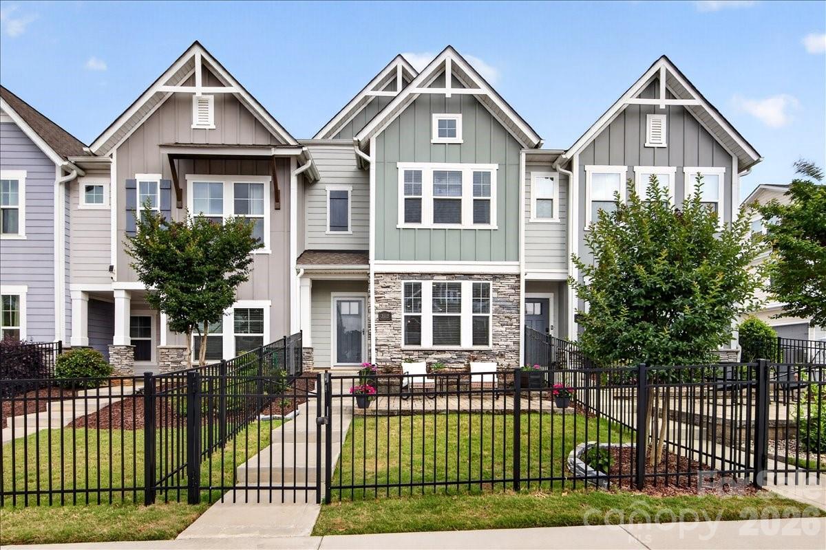 Beautiful, like-new townhome in sought after Villa Heights! This home has an open concept floor plan with a bright white main floor kitchen, perfect for entertaining. Upstairs offers three spacious bedrooms, including a generous primary suite with ample closet space. Enjoy the out door living with the fenced front yard and patio, ideal for pets and hosting guests. The two car garage is an added bonus! Villa Heights offers the perfect location between Plaza Midwood and NoDa, with all the great restaurants, close by.
