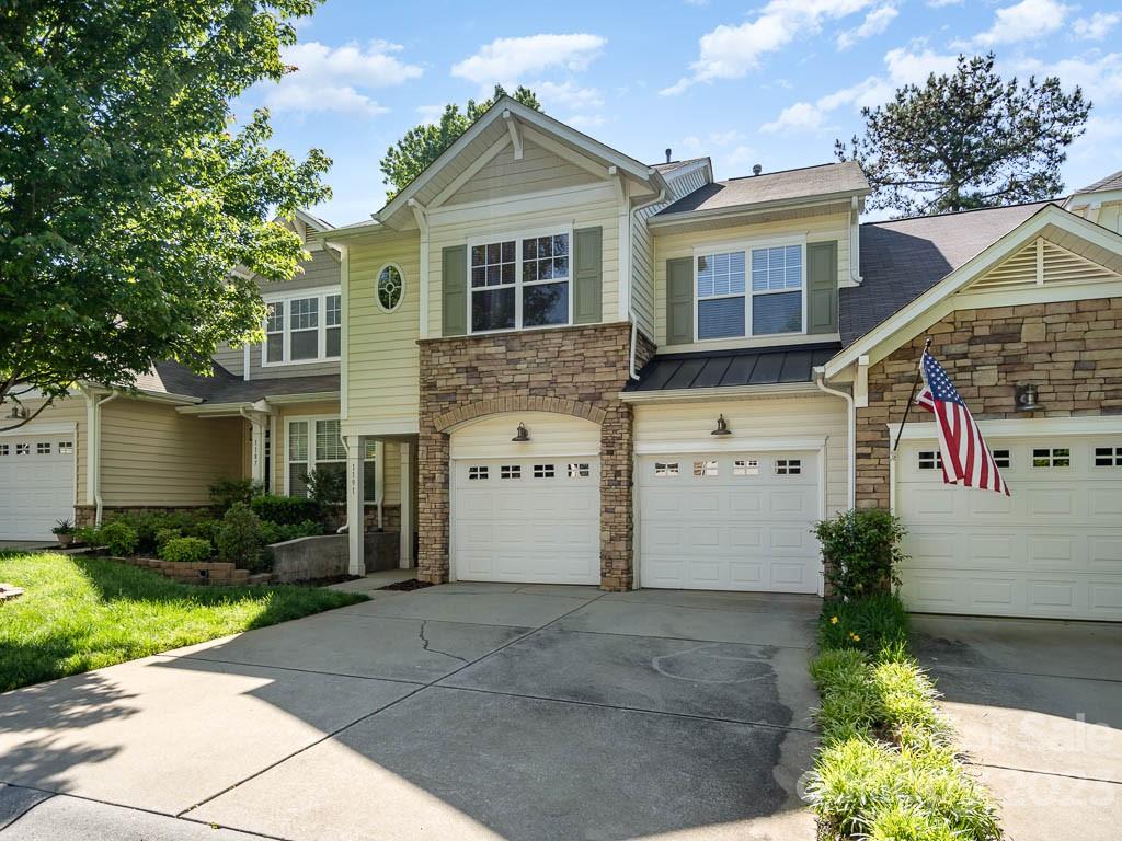 Spacious & move-in ready two story townhouse with rare two car garage in mint condition!  Three bedrooms and two and half baths. Built in 2007 has many upgrades which make this home exactly what you are hoping to find! Relax by the fireplace in living room and enjoy the private back patio. Hardwood flooring on the main floor. In kitchen: granite countertops, stainless steel appliances, gas range, island, breakfast bar, 42" cherry cabinets, tile backsplash and full pantry. Upstairs a large primary bedroom with en-suite bathroom, private balcony and walk in closet, two additional bedrooms, full bath, laundry room and a spacious loft ideal for home office. Located at well sought after community of Cobblestone has a community club house and a swimming pool for your enjoyment. Minutes from dinning, shopping, entertainment. Easy commute to Ballantyne and I-485 loop. Welcome Home!