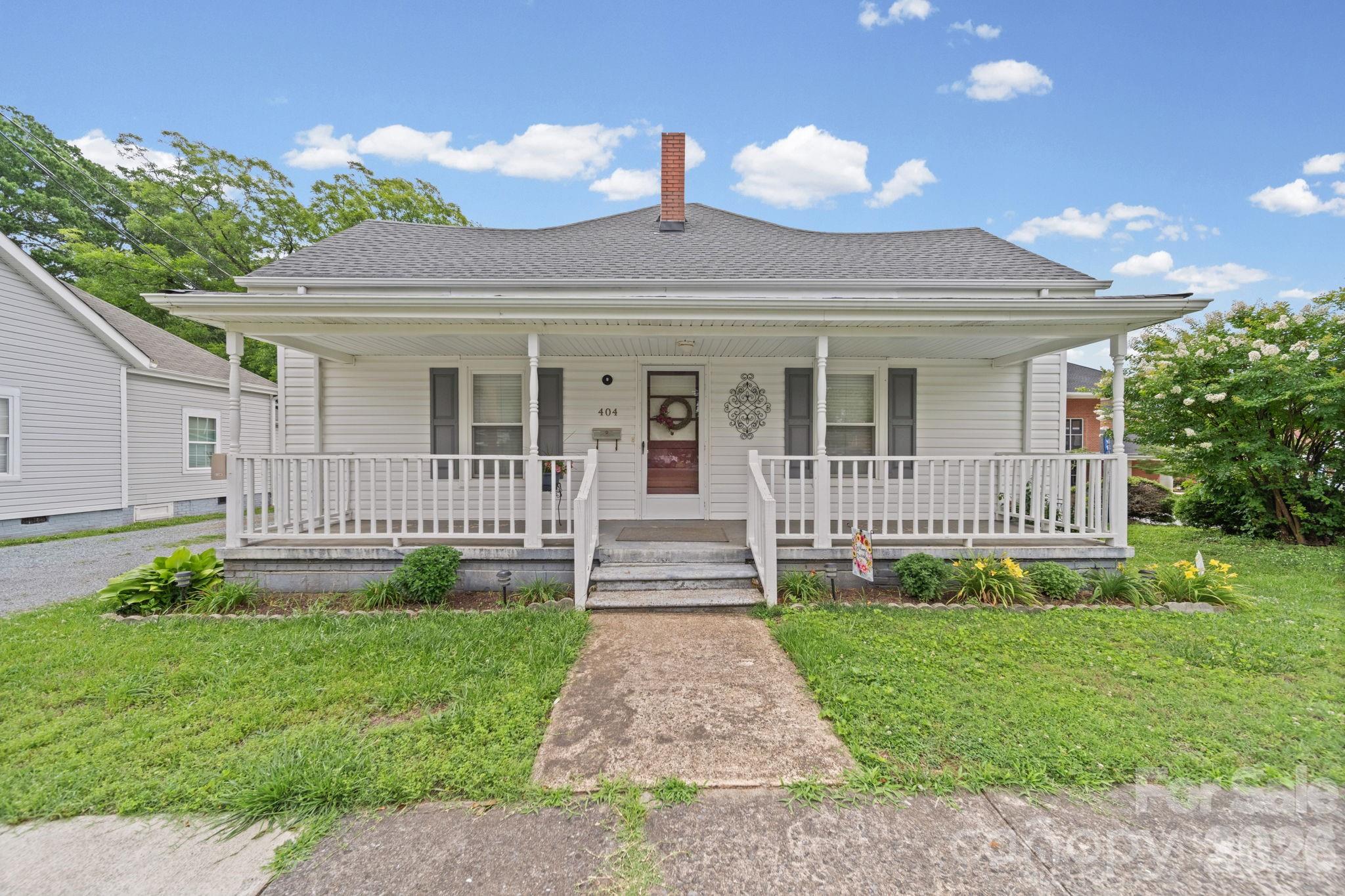 Great opportunity, 2 bedroom 1 bath 1 story on large lot, large updated kitchen, granite, lots of cabinets, large bedrooms, high ceilings, step in shower, rocking chair front porch, deck, 2 outbuildings, carport