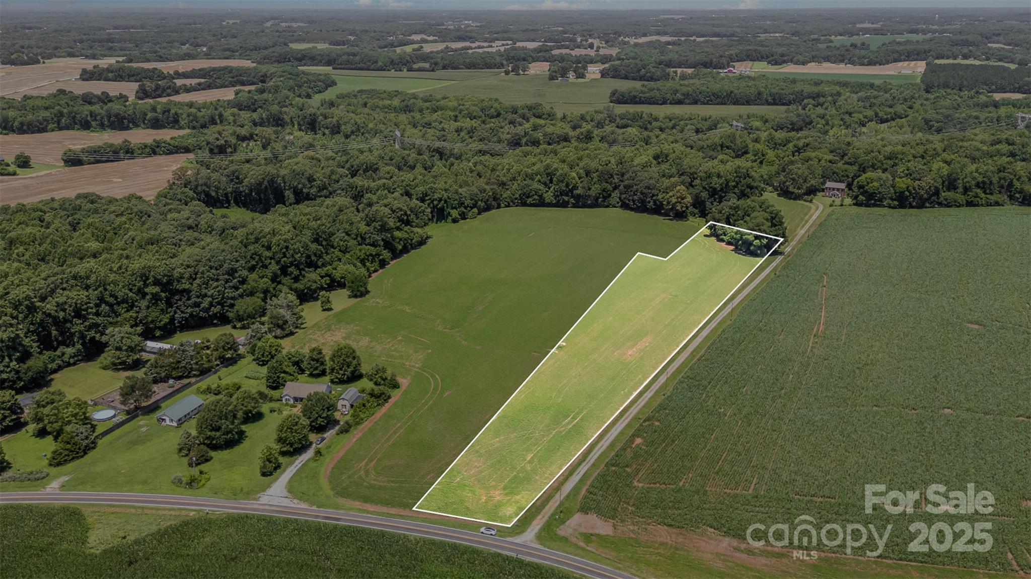 Discover five beautiful acres in a rapidly growing area of Rowan County—just minutes from scenic Sloan Park and with easy access to I-85 for a quick commute to Salisbury, Concord, Mooresville, or Charlotte. This level, open property has already perked for a 4-bedroom home, offering endless potential for a private homesite, mini-farm, or investment opportunity. With no deed restrictions for building, manufactured and modular homes are welcome. High-speed internet through Spectrum is available—perfect for those who work from home. Enjoy peaceful rural surroundings with the convenience of nearby amenities and continued development all around. Gorgeous land in a prime location—don’t miss your chance to own a piece of it!