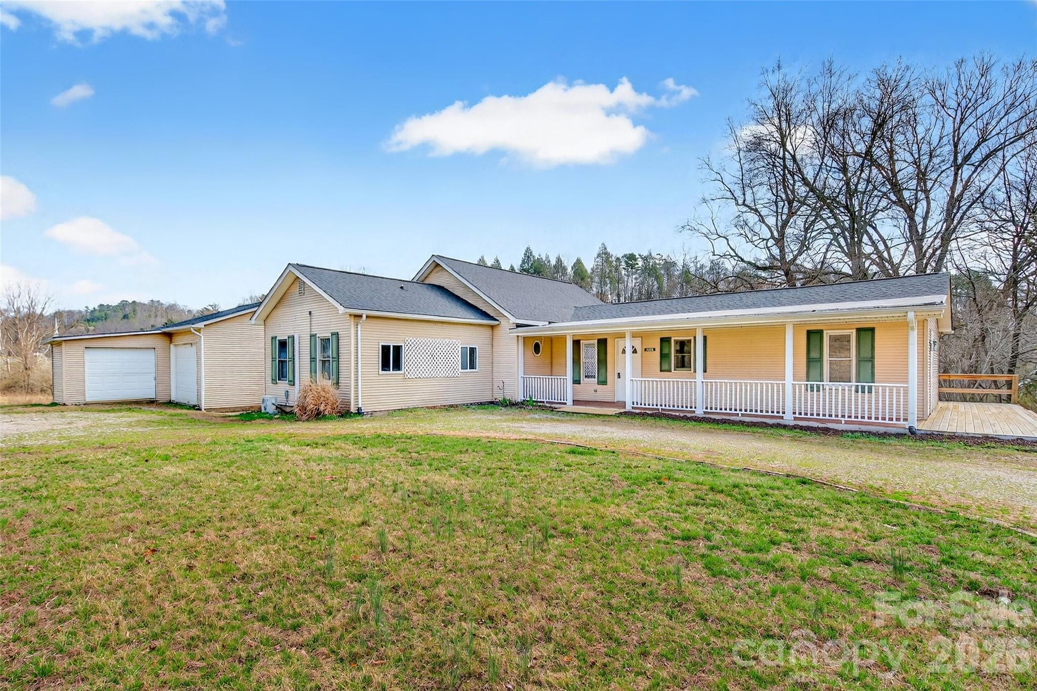 New Price on this This three-bedroom, three-bathroom home offers a compelling combination of comfortable living space. There's an additional room that could be an office, flex space or additional sleeping quarters. The generous 1 acre of outdoor grounds and location balances rural tranquility with everyday convenience. With 2,203 square feet of interior space, there is plenty of room for families to spread out and enjoy.

The lot size is one of the first things you will notice. Spacious and versatile, the outdoor area lends itself to gardening projects, entertaining guests around a fire pit, or simply giving household members and pets the freedom to run. In a market where generous lots are increasingly difficult to find, this property stands apart.

Inside, three full bathrooms keep busy mornings moving without conflict, while the primary bedroom provides a quiet retreat at the end of the day. The kitchen features a Jenn-Air gas propane cooktop paired with a Jenn-Air electric oven, giving home chefs the best of both worlds for everyday meals and ambitious weekend cooking sessions. Natural light fills the living areas, creating a warm and welcoming feel that photographs alone cannot fully capture.

The oversized garage is a standout feature, offering far more than just vehicle storage. Inside, you will find finished office space and a half bath, making it an ideal setup for remote work, a creative studio, or a private retreat away from the main living areas.

You get the peaceful feel of mountain living without feeling disconnected from the things that matter. At this price point, a property offering this much square footage and land does not come along every day.

Reach out today to schedule a private tour.