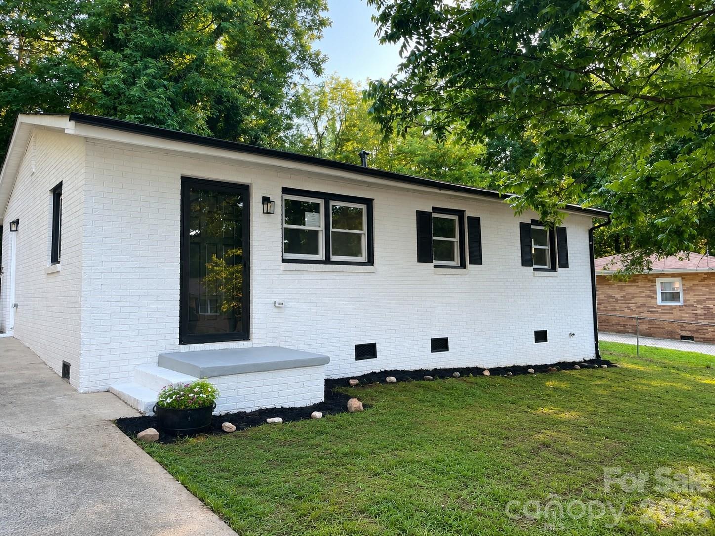 Completely renovated 3BR/1BA home located on a quiet dead-end street in Dallas offering modern finishes, open living spaces, and move-in ready convenience. This beautifully updated home features 925 sq ft of thoughtfully designed living space with new LVP flooring throughout, recessed lighting, fresh interior and exterior paint, updated HVAC system, updated electrical service, and numerous recent upgrades throughout the property.

The stunning kitchen features shaker-style cabinetry, subway tile backsplash, modern fixtures, stainless steel appliances, and warm butcher block-style countertops with an open layout flowing directly into the main living area — perfect for entertaining and everyday living.

The completely new bathroom offers a spacious double vanity, modern black fixtures, and an oversized tiled shower with frameless glass doors, giving the home a high-end feel rarely found in this price range.

Exterior features include a fenced yard, storage shed, rear deck, driveway parking, , and spacious outdoor areas with room for pets, entertaining, or future projects. Conveniently located near downtown Dallas, Gastonia, shopping, dining, and major highways. No HOA