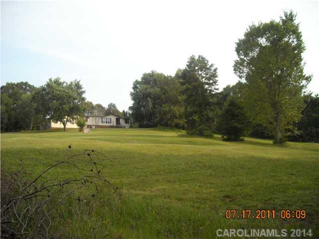 Hard to find land in Fort Mill, Very Peaceful over 3+ acres in a cul-de-sac, Build you dream home as your living in this one. Sold "as is, where is", conventional or cash buyers. New Central Heat and AC in 2010, New Thermo Windows in about half the home. The very best schools! Close to Douglas Intn. Airport, Lake Wylie, Rivergate Shopping Center, Parks and Places of Worship, Easy access to I-77
