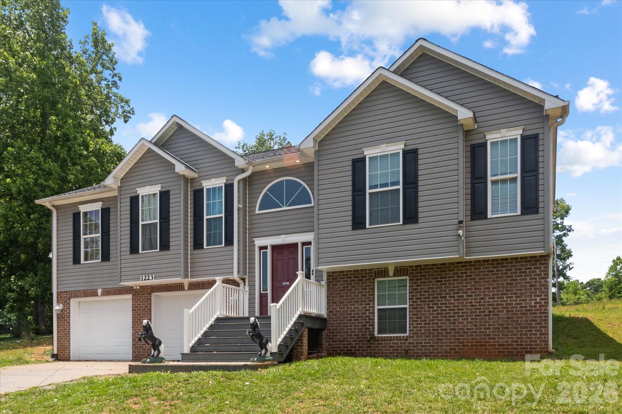 This home features a spacious great room, dining area, and kitchen with a vaulted ceiling, all situated above a full basement with a garage. The main level includes a primary suite and convenient laundry room located just off the kitchen. The private primary bath features dual vanities, a large walk-in shower, freestanding soaking tub, and a walk-in closet. Two additional guest bedrooms and a full guest bathroom complete the main floor.

The lower level offers even more living space with two large additional bedrooms and a full bathroom. One of these rooms could easily serve as a home office, media room, workout space, or bonus room to fit your lifestyle.

This home offers plenty of room for family and guests while providing the comfort and flexibility today's buyers are looking for.

The back deck is in need of repair. Seller is willing to provide a credit toward repairs or complete the repairs with an acceptable offer.

Don't miss this opportunity to make this beautiful property your own!