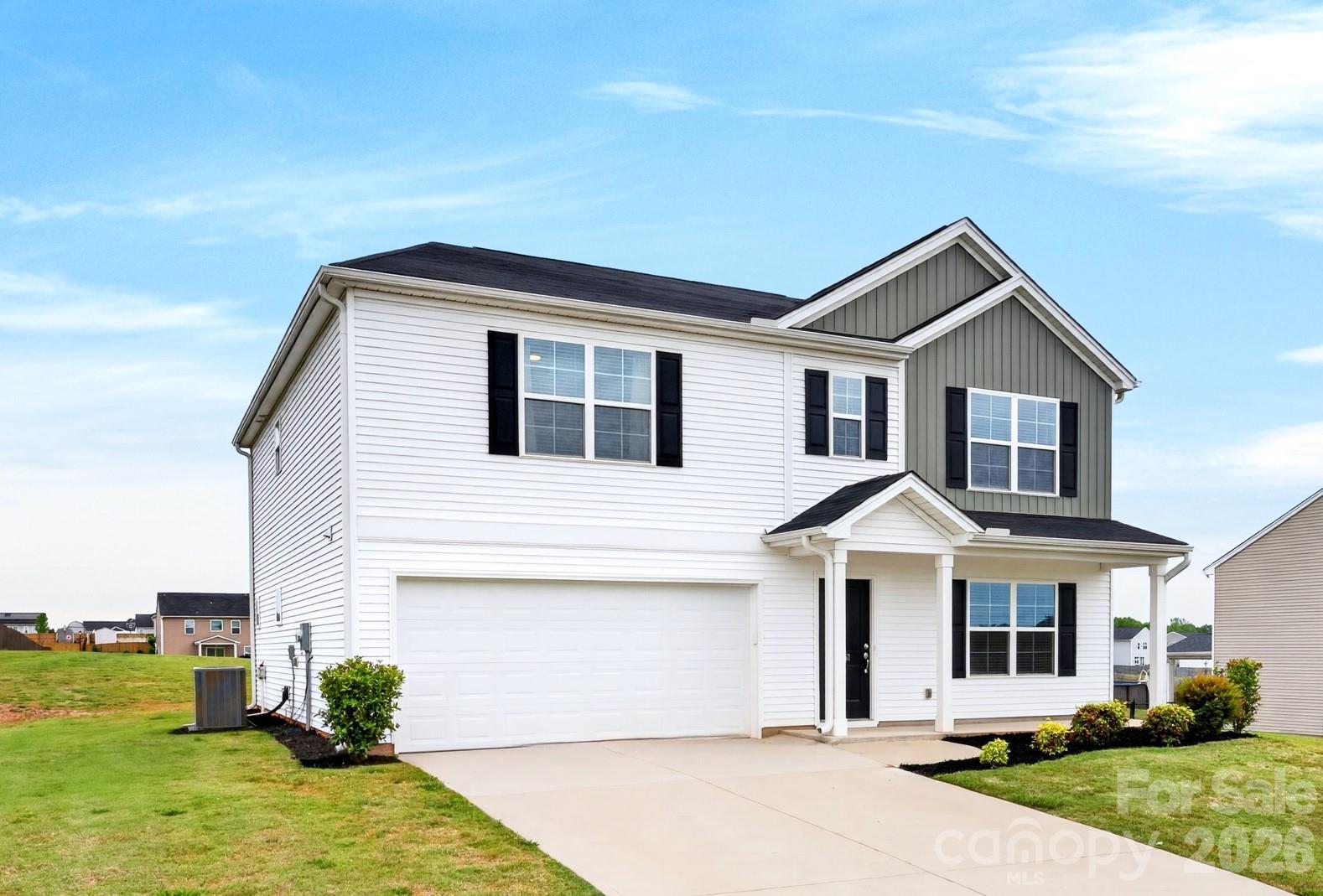 Practically brand new and shows like it — Mungo "Russell" plan on a 0.58-acre lot in Adens Place. Out back, the expansive yard meets unfenced open green space on the lot behind, for a parklike, wide-open feel rarely found in newer Boiling Springs construction. Step inside to a flexible downstairs office (work-from-home, study, hobby room — your call), then the floor plan opens up. Granite kitchen with walk-in pantry, upgraded cabinets, oversized island, and pendant lighting flows into the great room. The garden door opens to the backyard. Half bath downstairs handles guests. Upstairs, the primary suite stretches out: tray ceiling, DUAL walk-in closets, double-sink raised vanity, garden tub, and separate tile shower. Three more bedrooms — each with a walk-in closet — share a second full bath. Laundry is upstairs, where it should be. The flex play: a generous LOFT. Media room, second living space, gym, hobby zone — whatever fits your lifestyle. Energy built in: R-30 insulation, advanced framing, programmable thermostat, low-VOC finishes. Tilt-out windows. 2-car garage. Attic storage. Carlisle-Foster's Grove / Rainbow Lake / Boiling Springs schools. HOA $210/year. Flood Zone X. Public water, septic, electric heat & cool. Schedule your showing today.