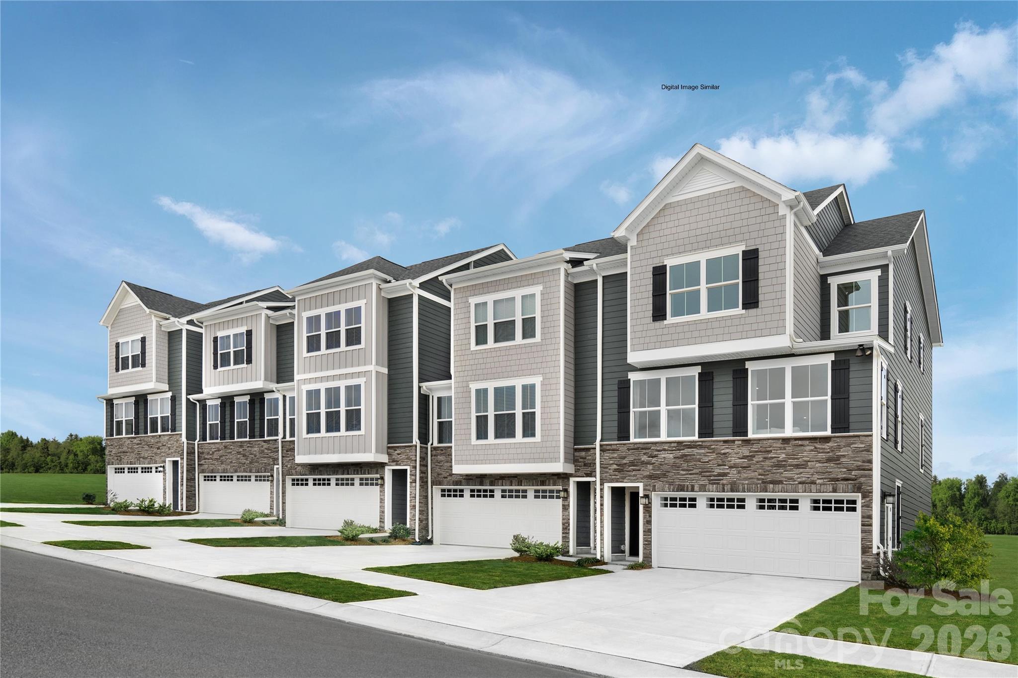 *Receive up to $20,000 in closing cost credits with the use of the builder's preferred lender.**Welcome to Creek Water! Indian Land's newest luxury town home community nestled in a quiet wooded area away from the hustle & bustle, but minutes from every day conveniences. Just south of Ballantyne, Hwy 485, Novant Medical Center, Publix, Harris Teeter, Walmart, Lowes, Costco & Target! This Serenade plan sits on a premium homesite backing to woods with nature views and showcases unique design elements typically found in single family homes. This charming townhome offers comfortable living in a thoughtfully designed setting, highlighted by its prime location beside a generously sized common area—perfect for enjoying open space, outdoor relaxation, and a sense of community right outside your door. An open, light filled main living area with a spacious kitchen including quartz counters, upgraded cabinets & a 10' island. Two highlights of this home are the covered outdoor living area off the main floor & the bed/bath option on the 1st floor. Enjoy rural tranquility near all your everyday conveniences in a master planned community w/ a beautiful future amenity with a pool & cabana, as well as the adjacent Deputy Roy Harden Park with playground, trails and picnic pavilions. You will not want to miss out on owning one of these exclusive luxury town homes!
