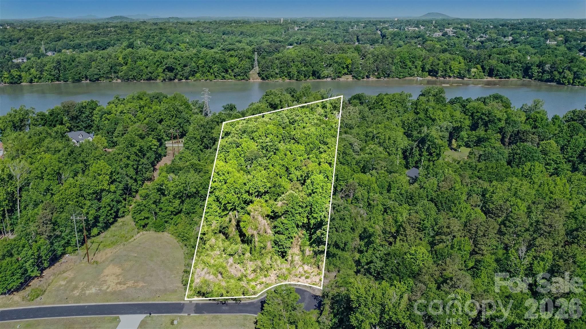 Over one acre of land available in the desirable River Walk Plantation community near the Catawba River, surrounded by beautiful luxury homes. Beautiful waterfront community. Large 1.28 acre, nicely wooded lot in private cul-de-sac. 

This property offers potential for a future custom home or long-term investment. No soil evaluation or perc test has been completed. Buyers are encouraged to complete all due diligence regarding intended use and development feasibility. The neighborhood features an HOA with recorded CCRs and an Architectural Review Committee to maintain high standards and protect property values.
