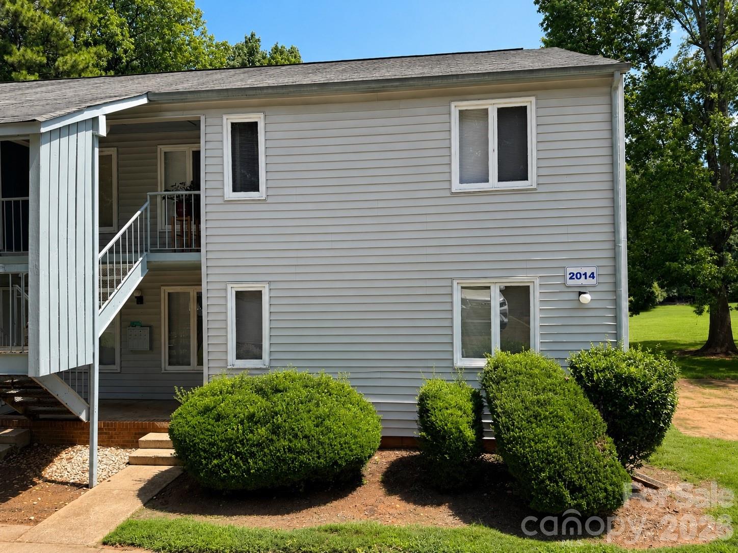 Investor alert! Just updated in June 2026 - Brand new floors throughout! Replaced sheetrock on ceiling in bathroom, and repainted entire bathroom for a cohesive, fresh look! Charming first-floor, end-unit condo—Excellent investment opportunity with strong rental potential, or a great option for buyers using non-warrantable conventional financing! Located in a quiet section of the community and features an open floor plan with stunning views of a peaceful grassy common area and mature trees. Ideally situated near shopping-including Southpark Mall, amazing restaurants, golfing, parks/greenways, and the light rail, it offers outstanding convenience for commuting and getting around town.  **A long-term tenant is currently in place on a month-to-month lease and would like to stay, making this a seamless opportunity for investors**  Don’t miss this versatile property in a sought-after location! Hot water heater replaced 6/2024 and 2 new windows to be completed before closing! Note: Condo is non-warrantable due to owner vs. tenant occupancy ratio.