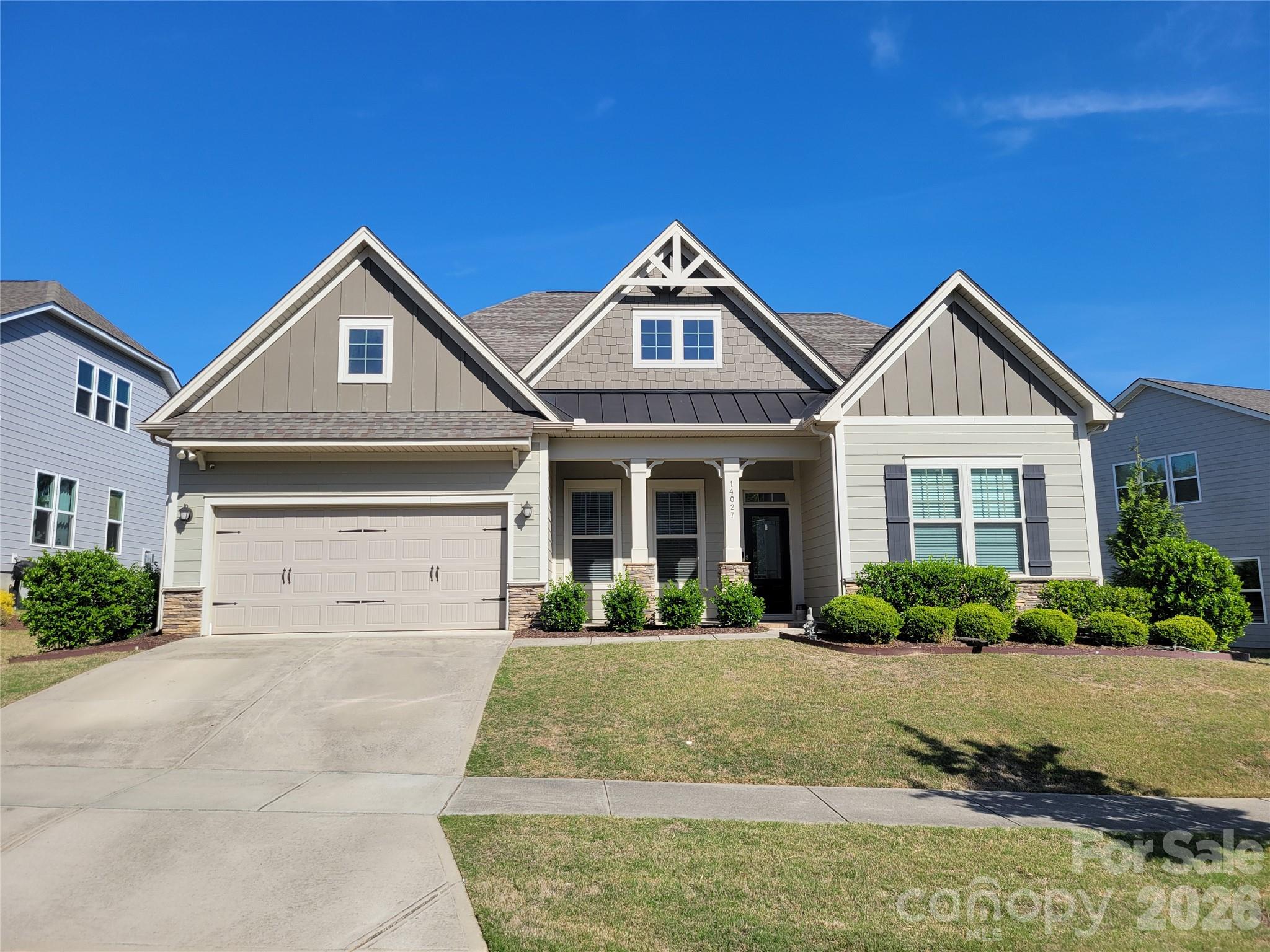 This ranch home with one bedroom and a bath upstairs has 10-foot ceilings on the main level and 8-foot interior doors.  3 Bedrooms, including owners suite on the main level with 2 full baths. Large open great room with a gas fireplace open to the kitchen and breakfast area.  The kitchen has an oversized island that seats 6 at the bar.  Double ovens, all stainless steel appliances remain.  Walk-in pantry with wooden shelves. Neutral paint throughout.   Formal dining room.  Split bedroom design 2 bedrooms with a full bat between them.  The owner's suite is huge with a large sitting area full of natural light.  The owner's bath has a large walk-in shower, double vanity, and spacious walk-in closet.  Full-sized utility room with sink, drop zone, and coat closet.  Home includes Social Membership into the Palisades Club, which includes the pool, tennis, pickleball courts, walking trails, and North Reach members' Lake House and canoe launch.  286 square feet of walk-in attic access!  Showings start May 21.