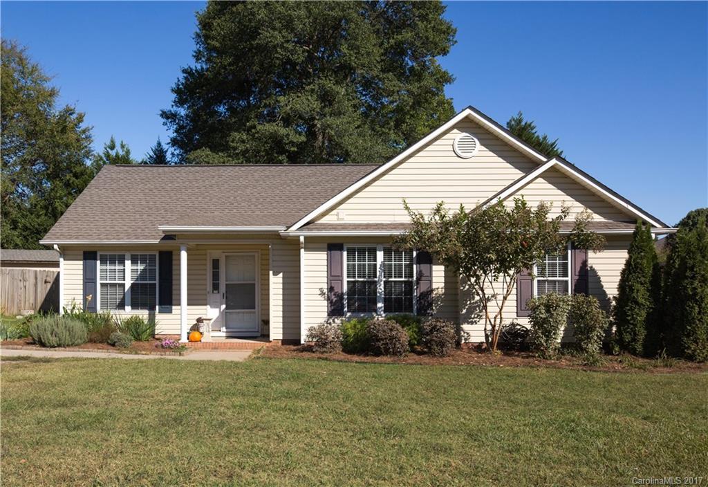 This awesome 3 bedroom 2 bath ranch home is move-in ready and waiting for you! From the gorgeous wood floors to the fresh paint and updated fixtures this home will welcome even the most particular buyer. The vaulted ceilings make the home comfortable and the fireplace make it cozy! The fenced back yard offers privacy for your next barbecue. Don't miss this one.
