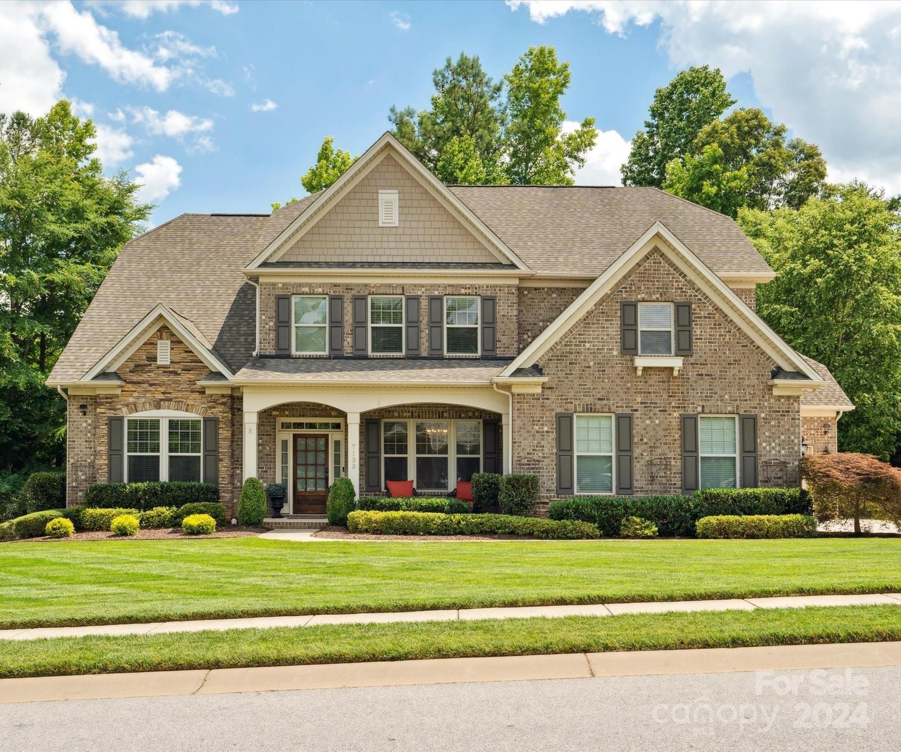Welcome home in the coveted Barber Rock neighborhood! This luxury home boasts a 2023 tankless hot water heater with recirculation pump and whole house water filtration system. Enjoy modern convenience with quiet belt-driven garage door openers, WiFi-controlled sprinkler system, programmable outdoor lighting. Technology is top-notch with a CPI system, four Ring cameras with solar, Nest thermostats with room sensors and a smart sprinkler system. The stunning stone patio features a built-in kitchen with natural gas, smoker, and fire pit. Indoors, benefit from a JennAir microwave/convection oven, custom primary closet (2023), and energy-efficient attic fans. A new whole house air purifier and 2021 split system AC in the garage ensures comfort year-round. This home seamlessly combines elegance, technology, and efficiency. Great location between Fort Mill and Ballantyne, with top rated schools and proximity to a variety of dining and shopping. Schedule a showing today!