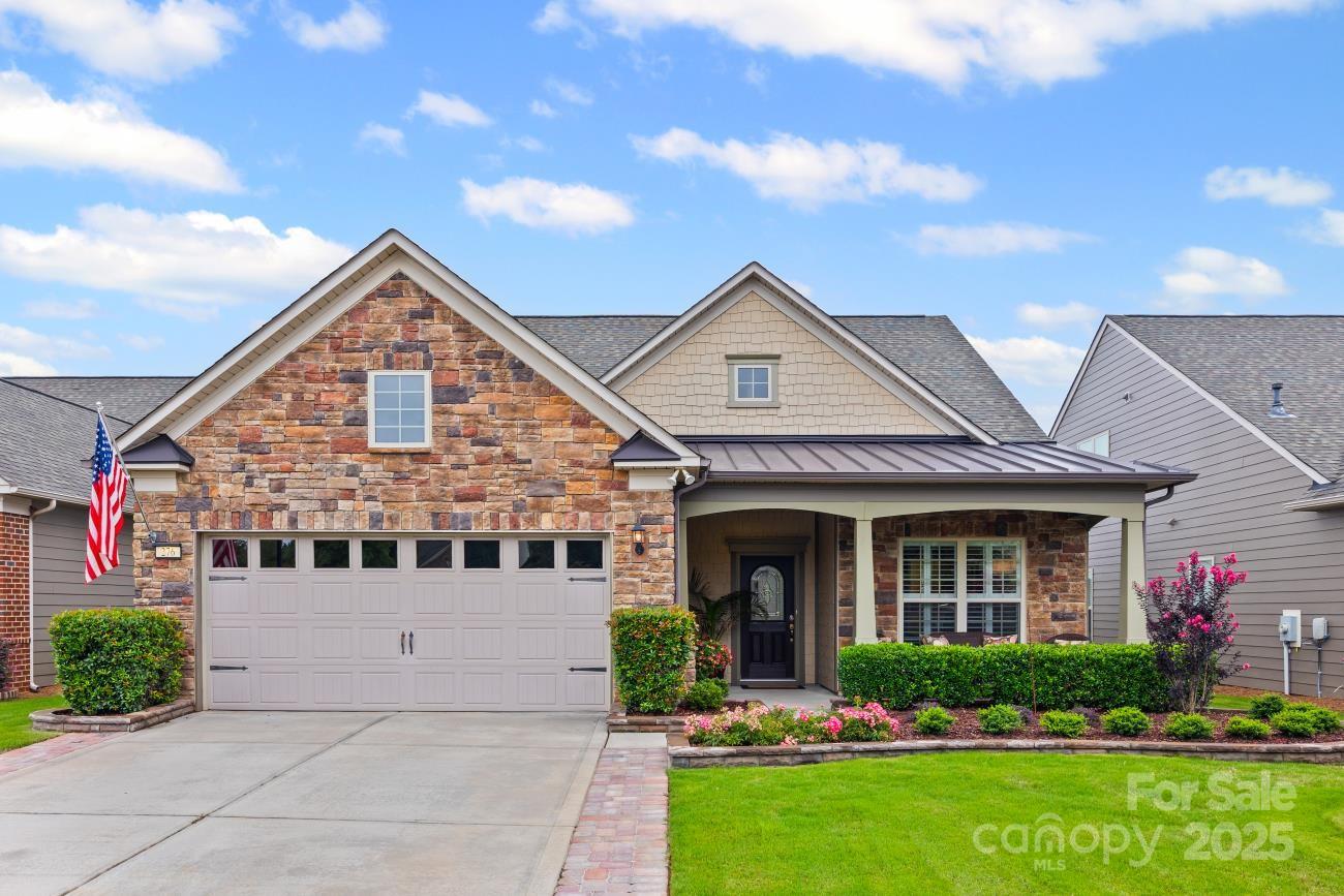 Welcome to this VERY desirable Martin Ray model, 3 BR/2 Bath w/ loft located in the 55+ community of Carolina Orchards. This meticulously maintained/updated home is perfect for those seeking a turnkey property. Primary suite on main floor overlooks a private backyard. Two additional main level BRs, office, & upgraded crown molding.  The gourmet kitchen is a chef's dream, with gorgeous quartz counters, Farm sink, upgraded stainless steel appliances, & space to entertain. Upstairs the large loft has limitless potential. Natural light fills this home through Plantation shutters, creating a setting to enjoy moments of peace. Enjoy rainy days on the covered front & rear porches. Home has full-house Surge suppressor & extended driveway. Professionally designed front yard landscaping is less than a year old. Residents enjoy a clubhouse, fitness center, indoor & outdoor swimming pools & various social activities tailored for those like-minded neighbors. You don't want to miss this opportunity.