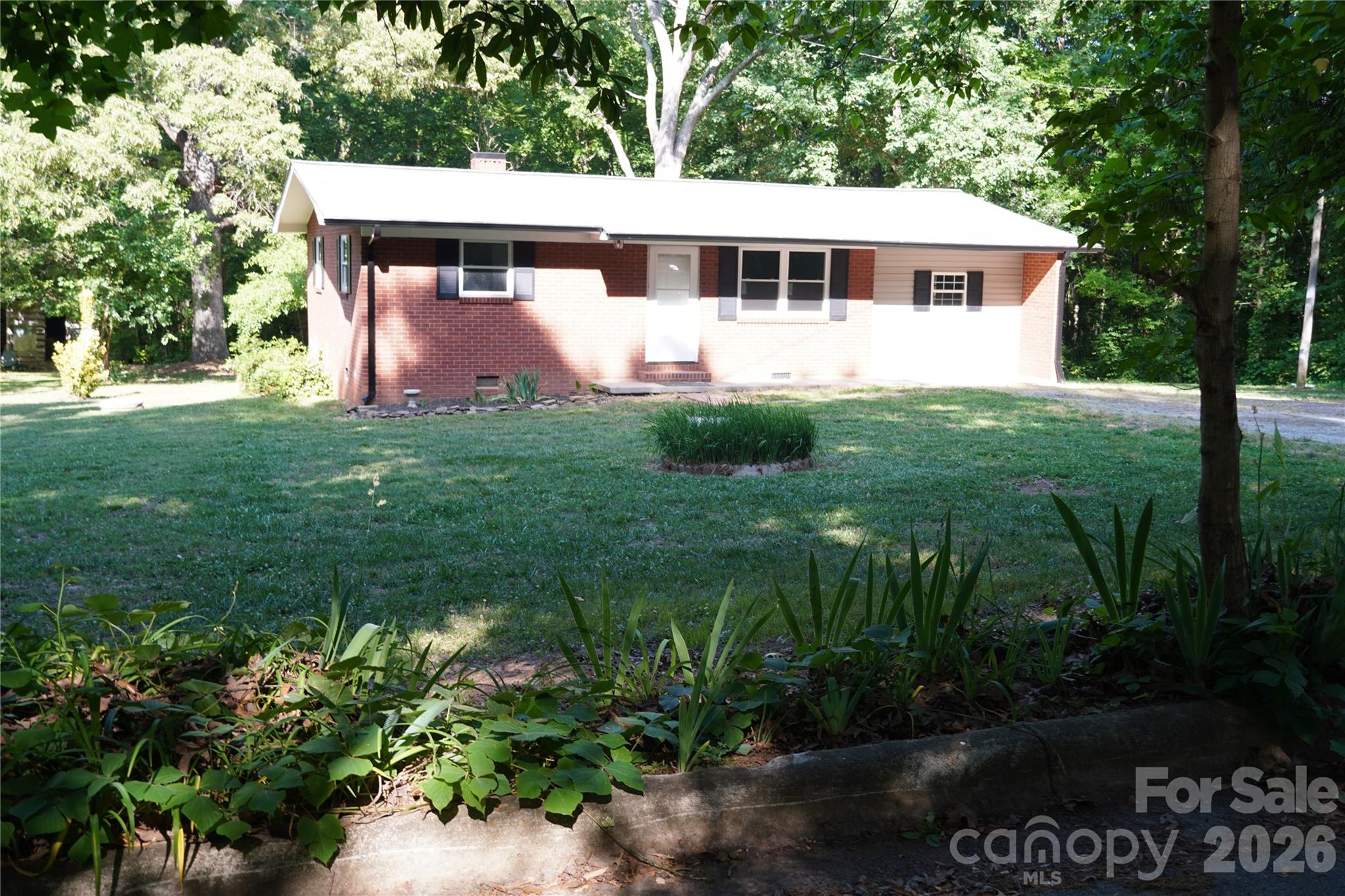 Move in ready home located on a dead end road with numerous recent updates! This brick home features a brand new HVAC system, all new flooring, fresh interior paint throughout, new interior and exterior doors, an upgraded 200 amp electrical service, and more giving buyers peace of mind on major improvements. This property also offers city water, sewer, and trash pickup for added convenience. With its low-maintenance exterior and affordable price  this house is full of potential and ready for you to make it a home!
