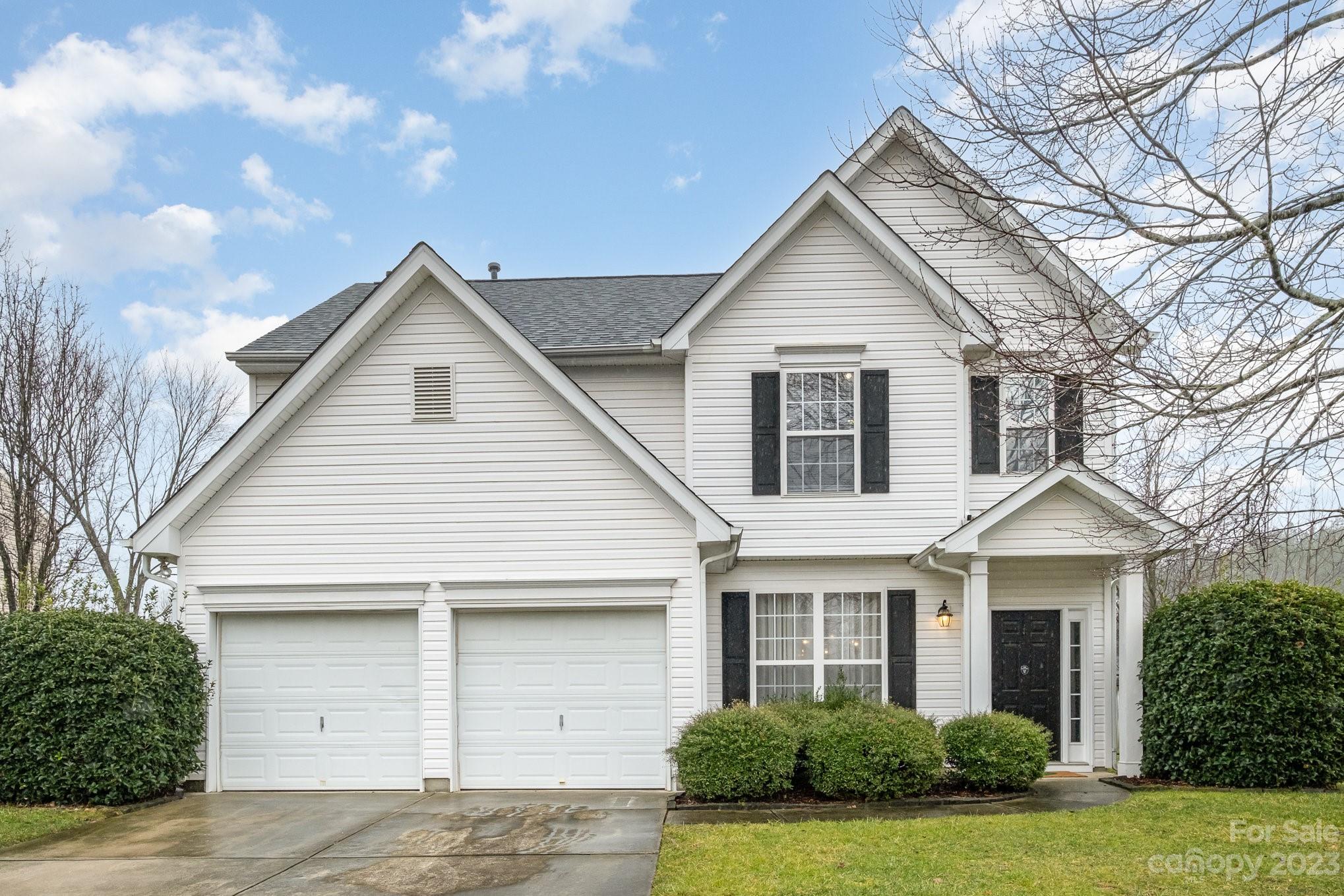 Charming 4-bed, 2.5-bath home in Charlotte's Woodlands subdivision featuring an open floor plan and offers a modern touch with updated light fixtures, door knobs, and hinges. The many improvements include a new roof (2019), fence (2020), LVP and stair carpet (2022), attic fan (2023), and duct cleaning (2023). The kitchen features a breakfast area and has a pantry. Enjoy the cozy gas fireplace in the Living Room that steps outside a patio, perfect for entertaining or enjoying peaceful moments. The spacious, flat backyard is an inviting retreat, ideal for various outdoor activities. The fenced-in area provides privacy and security. The home includes a spacious laundry room with ample storage.