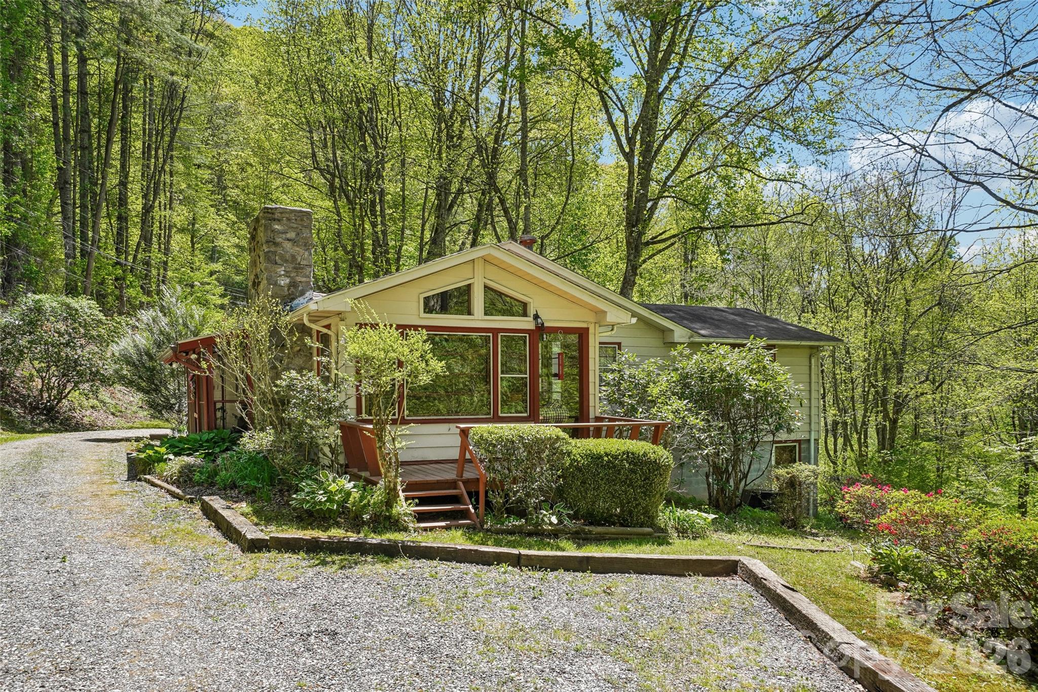 66 Pinto trial is a private retreat offering the peaceful lifestyle of Western North Carolina.  The home has vaulted living area with three rooms and two bathrooms, situated on a generous 1.71 acre lot that provides privacy, natural light and surroundings and room to enjoy the outdoor living.  A traditional mountain=cabin character with a fireplace, skylights, vaulted living area, wild life, garage space and an unfinished basement for storage or future expansion.  
The property is located just outside downtown Sylva and even closer to Waynesville on the Balsam side, allowing residents to enjoy a quiet rural setting while remaining close to local shopping, restaurants, healthcare and education.  Sylva and Waynesville are recognized fort heir charming downtown district, untainted views, outdoor recreation opportunities, and proximity to Western Carolina University and the Great smoky mountains region and City of Asheville.
With its wooded acreage and established setting 66 Pinto trail appeals to buyers seeking a mountain retreat, seasonal getaway, or full time residence in the heart of WNC. Classic mountain property - Seclusion, natural Beauty,  and convenient access to two delightful counties.
Tax record shows 2 beds but there are no septic records on file.  2 bedrooms with a bonus room