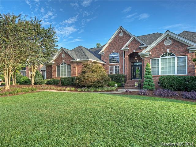Custom home with spacious living space inside and out.  Home includes a gorgeous in ground pool with covered porches on over 1.2 acres in a private setting.  Featuring a professionally designed kitchen and dining areas with 6 bedrooms and 8 baths.  This home also includes multiple bonus rooms, play rooms, and sunroom with a fully equipped media room. You will be impressed with the 5 car garage with a full workshop and the in home gym and home office.