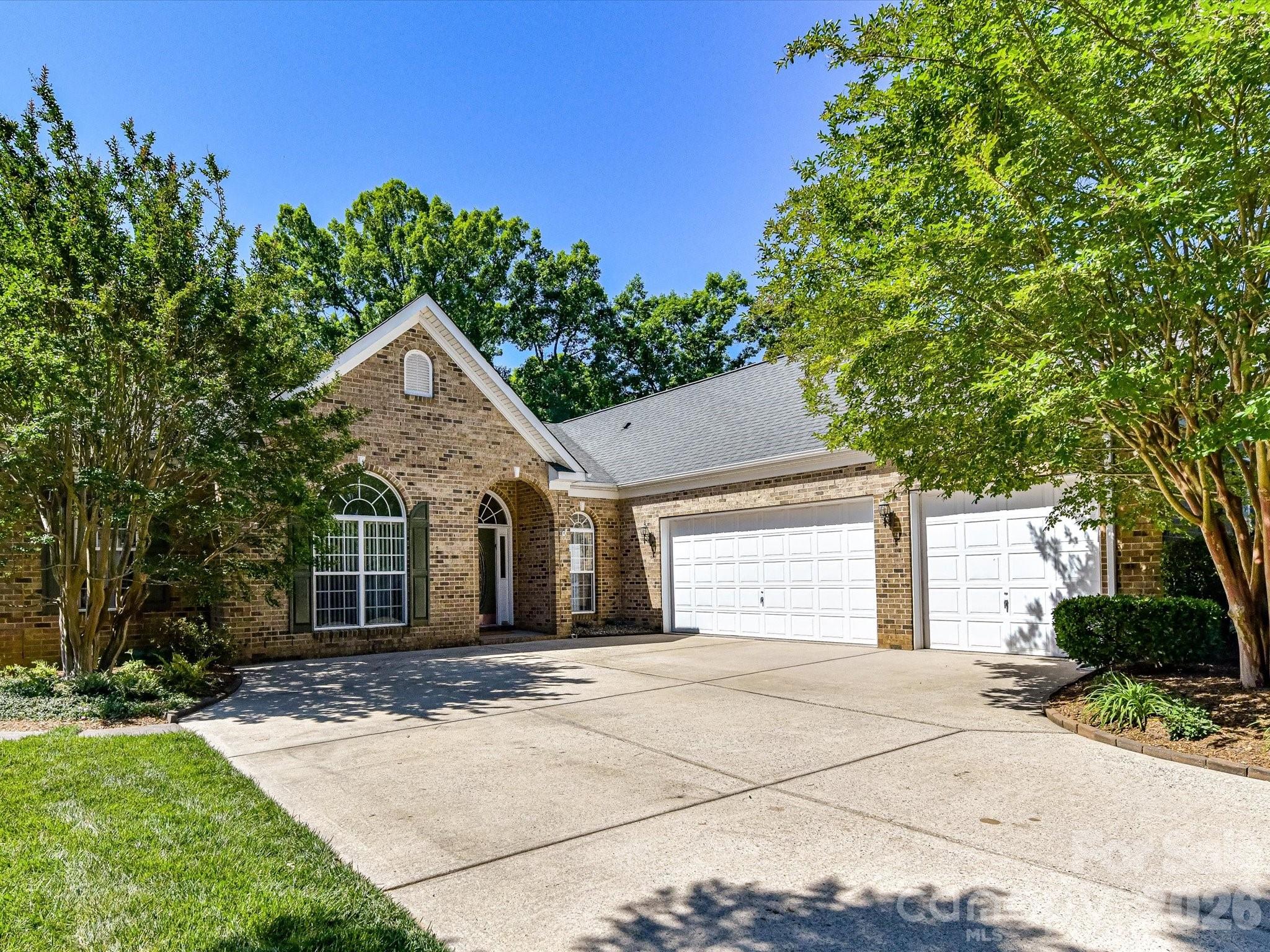 Nestled on a private cul-de-sac, this elegant 2,668 sq. ft. brick-front home offers the pinnacle of effortless main-level living. The expansive, single-story floor plan features high ceilings and an ideal split-bedroom layout for maximum peace and privacy. At the heart of the home, a spacious great room showcases panoramic views of a stunning backyard oasis, complete with a cascading waterfall and serene koi pond. 

The gourmet kitchen is a chef’s dream, boasting premium granite, stainless steel appliances, a 5-burner gas range, and double wall ovens. The Kitchen is open to the intimate breakfast area and spacious family room with cozy Gas fireplace. Retreat to the expansive primary suite, featuring a tray ceiling and luxury bath with updated ceramic tile, a deep, whirlpool garden tub, and a step-in shower. Two guest bedrooms are connected by a shared Bath. A versatile fourth bedroom with a double door entry makes an ideal home office or hobby space, too. Complete with a 3-car garage, dedicated laundry with sink, and a peaceful, low-maintenance setting, this property is perfect for refined living. First showings Thursday 5/28.