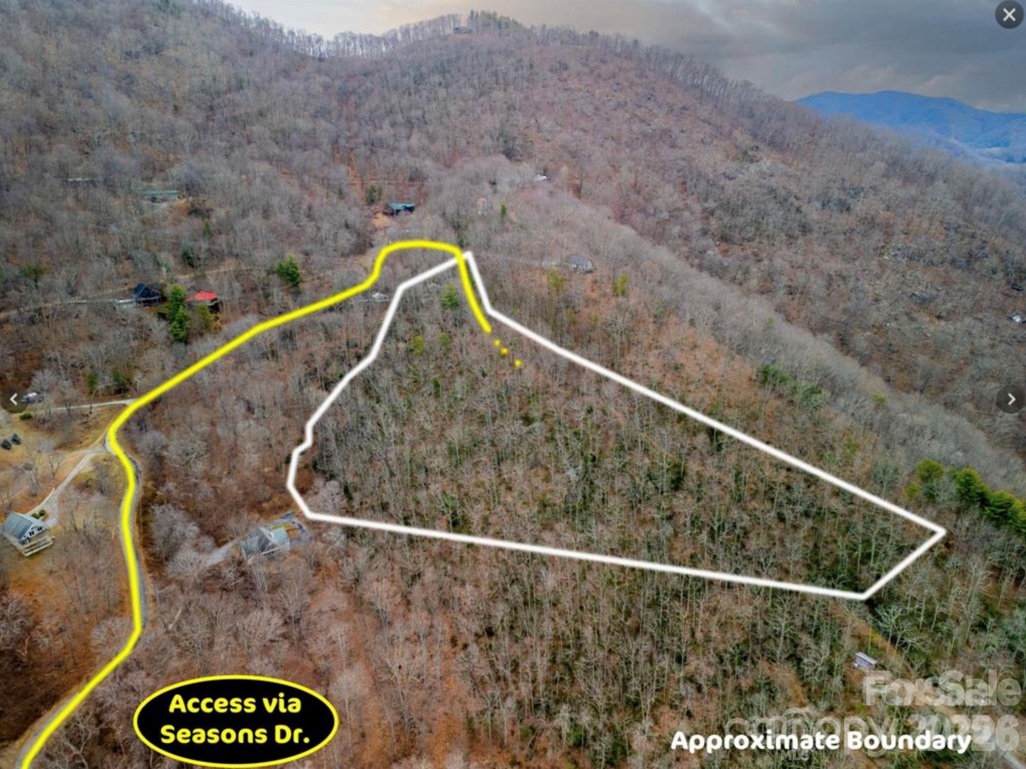 Nestled in a tranquil setting, this 5.13 acre wooded lot offers the perfect opportunity to create your own private sanctuary. Immerse yourself in the beauty and sounds of nature. Escape the hustle and bustle of everyday life & find peace in the quiet serenity of your wooded retreat. Despite its secluded feel, the property is conveniently located just a short drive from town, offering easy access to essential amenities. Don't miss your chance to see this idyllic setting!