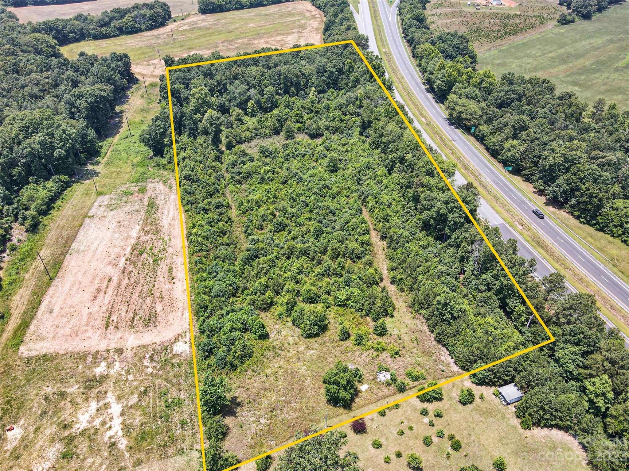 You are looking for a lot with a beautiful location and great potential. Is this the one you need. 
Property located in Mooresboro. The land is flat. 4.6 acres. Located in a beautiful area. According to Cleveland County, the land can be used for a manufactured, and single family home, no perc test done yet. 
Close to the Hwy. Excellent opportunity for investors or to build a beautiful property.