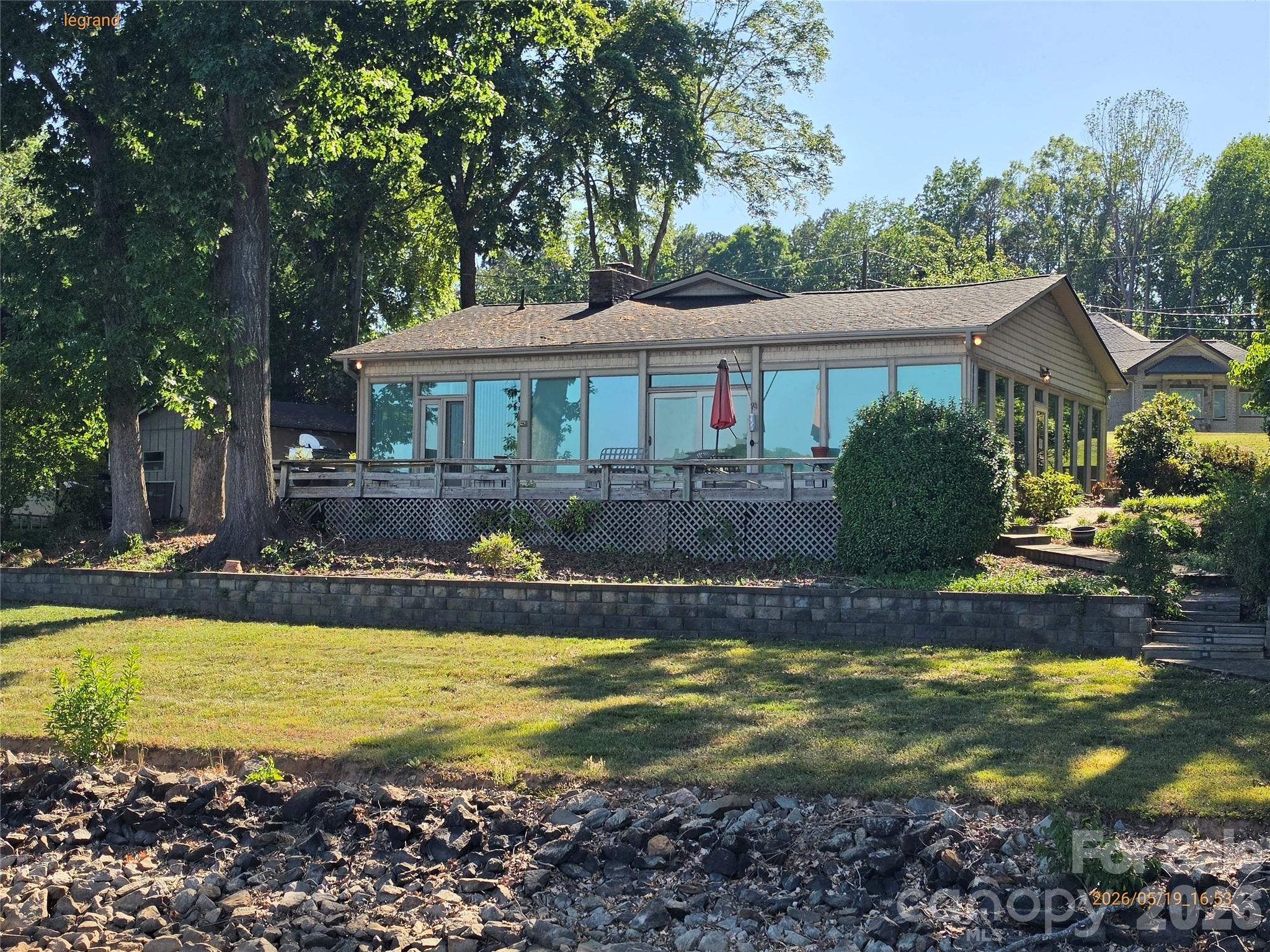 Approximately 180 feet of water frontage on main channel, ready for rehab upgrades and designs or tear down and build dream home from scratch. This sale is being monitored by the Catawba County Clerk of Court but is NOT a foreclosure sale. Sold with free and clear title.  5% minimum earnest money required and subject to 10 day upset bid period with the court. Please contact your REALTOR today for more information on these types of sales and a showing.