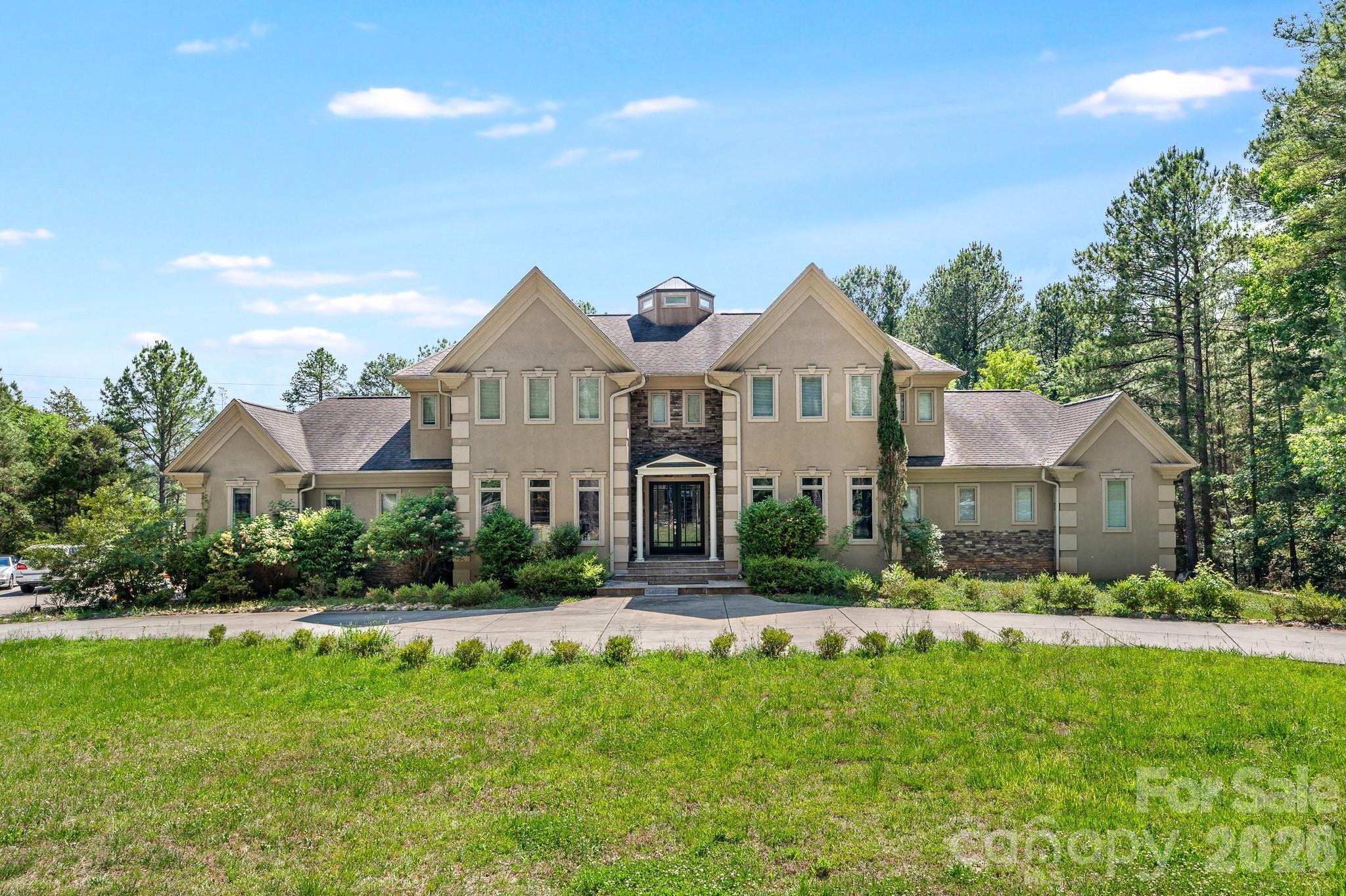 Incredible Custom Home on over 3 acres is Desirable Weddington w/ low Union County taxes.