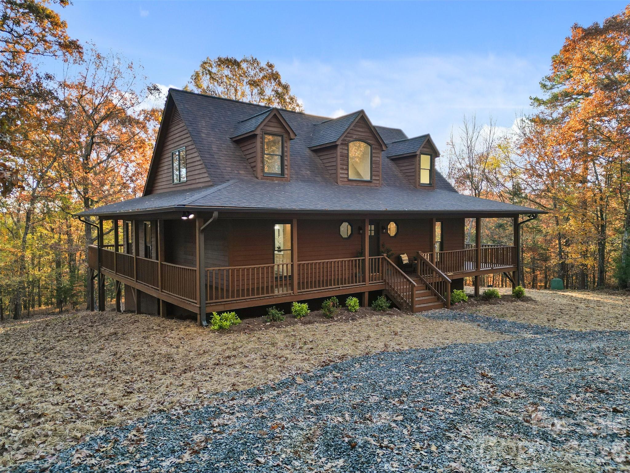 If you are desiring privacy, space and unlimited potential with NO HOA - this is the one! Tucked away on just under 2.7 wooded acres, this thoughtfully updated 3-bedroom, 2.5-bath home offers both seclusion and convenience—just minutes from downtown Mt. Pleasant’s charming dining and shopping area. 

You will be warmly greeted by a cozy, covered front porch - perfect for morning coffee, relaxing with a good book or enjoying evening breezes. Step inside to find fresh paint, modern lighting, and an updated kitchen featuring refreshed cabinetry, granite countertops with peninsula seating, stainless steel appliances, and a sunny bay window breakfast nook. A formal dining room just off the kitchen features a second charming bay window that overlooks the side deck and serene wooded views.  This flexible space is perfect for entertaining and could also easily serve as a home office or a playroom. The main level laundry room is located steps from the kitchen and can double as mudroom with an exterior door to the side deck, providing ease to daily routines and offering practical storage/organization solutions. The open living room boasts cathedral ceilings, rich natural light, and sliding doors that open to the expansive wraparound deck that invites you to grill, entertain, dine outdoors or unwind with a glass of wine, making you feel completely immersed in nature and a world away from it all. 

The main-level primary suite offers a spa-like retreat with an oversized walk-in tiled shower and quartz countertops on your double vanity. Upstairs you’ll find two spacious bedrooms, a full bath, and new carpet throughout. Red oak hardwoods flow through the main living areas, complemented by new LVP in the kitchen, laundry, stairs, and second-floor bath.

The unfinished walkout basement offers endless possibilities for future expansion, workshop, storage or even a garage, providing an additional 1,383 square feet of opportunity to finish as you choose. See artist rendered image for just one way you can utilize all the extra space!

Enjoy the feeling of being tucked away in nature while being close to all the charming amenities that Mt. Pleasant has to offer—this is the best of both worlds!