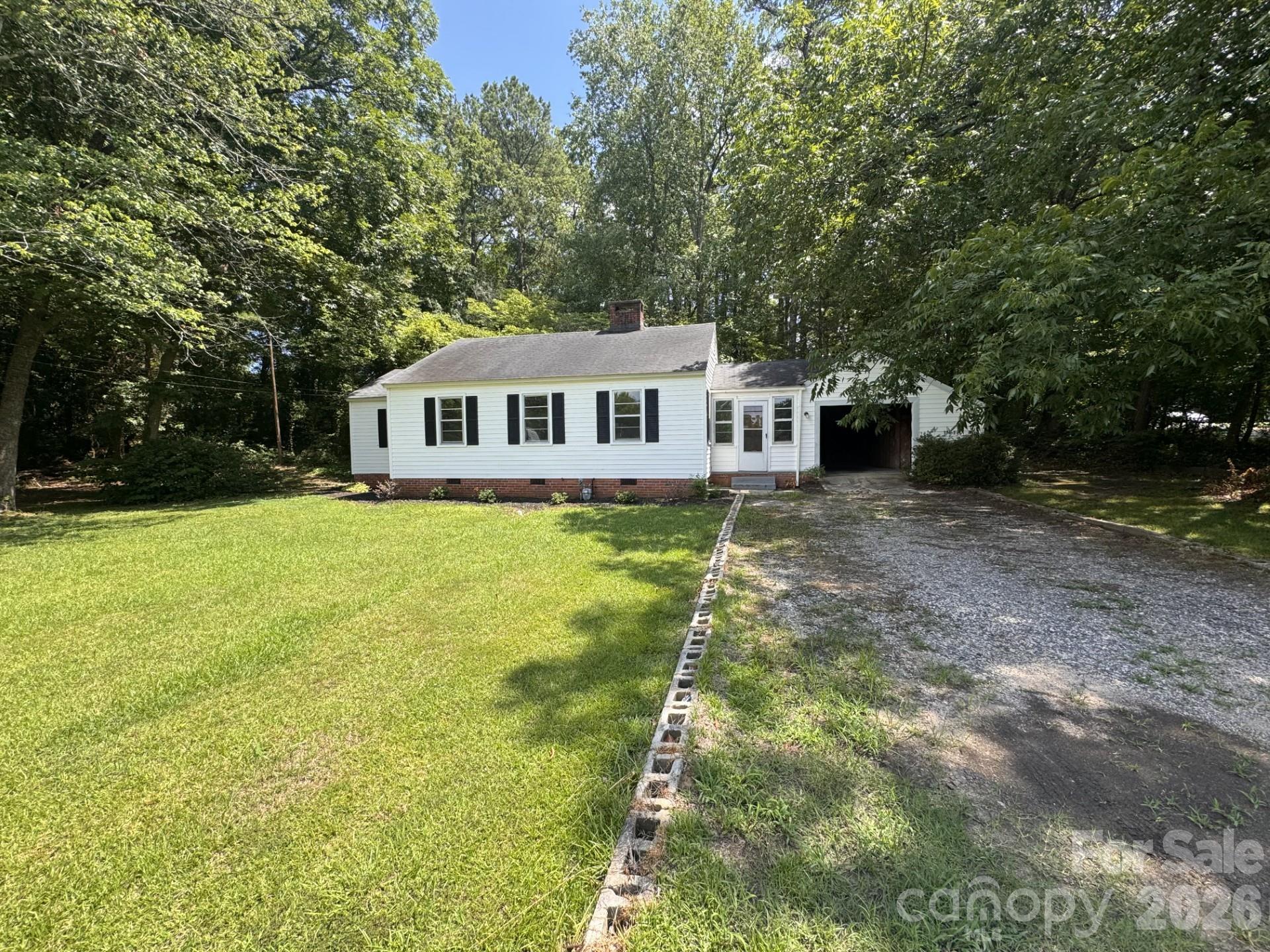 Lot can be subdivided! Welcome to 1250 Hampton Grace Ave in Lancaster, SC! This beautifully remodeled home sits on a rare 1.25 acre lot, offering space, privacy, and flexibility. Recent updates provide a fresh, move-in-ready feel, while the expansive acreage is perfect for outdoor living, entertaining, gardening, or future expansion. Enjoy the peace of country-style living with convenient access to nearby amenities. A hard-to-find combination of updated home and generous land—don’t miss this opportunity!