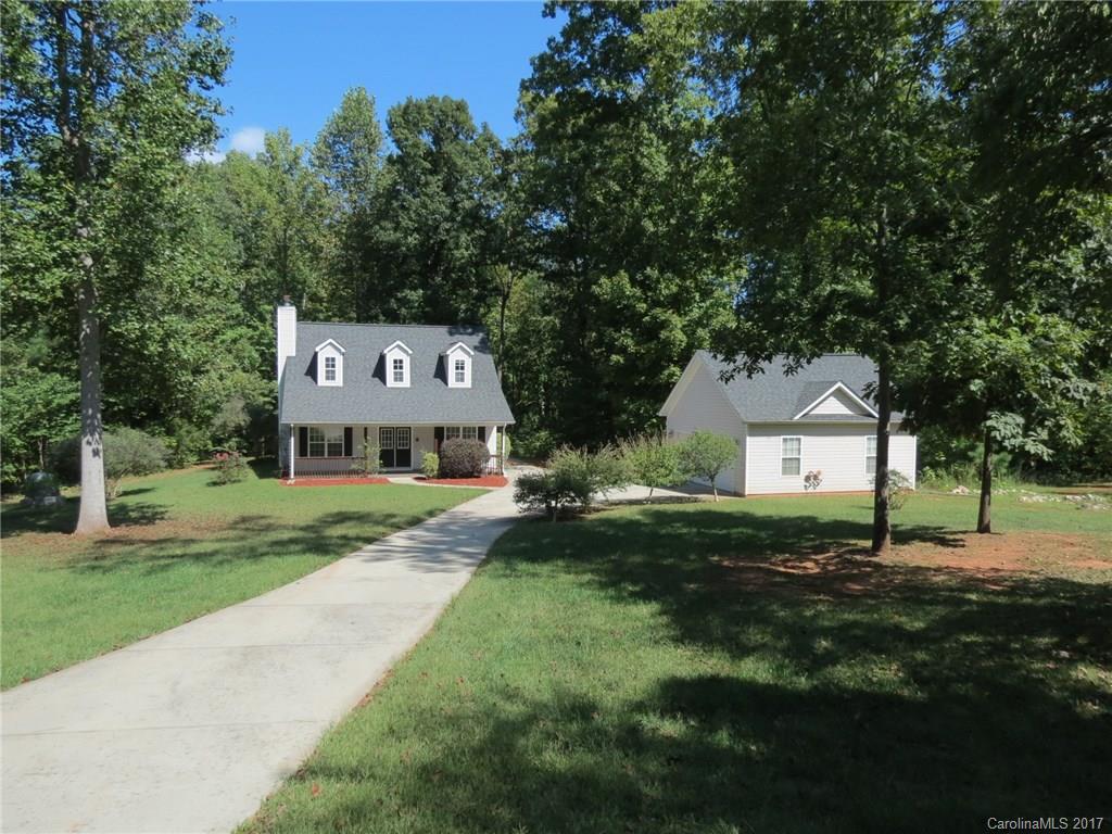 Very nice home in quiet subdivision.  The home is a 3 bedroom with a large living area and the master bedroom upstairs.  Large screened porch overlooks the private back yard.  Large detached garage for parking cars or a very nice workshop.  This home is a must see.