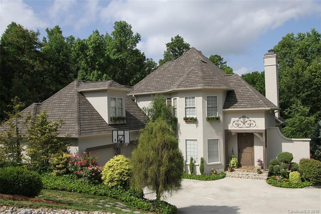 Stunning waterfront & sunset views - sandy beach access. Community slip leased minute away. Well appointed custom built three level plan w/master on main. Water view from living spaces and master bedroom - gorgeous! Gourmet kitchen w/Viking range, new SS refrigerator. Luxury MBTH & BRM w/view. 6 BRMs & 4 full baths - space for all. Two great rooms - main & lower levels. Wet bar for parties. Upper level rec room. Huge storage space & cedar closet. Priced well below tax value and beautiful home.