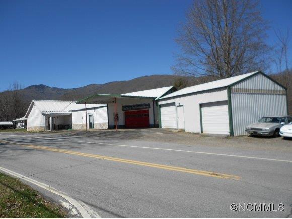 Unique buildings with many potential uses. There is a 1 bedroom apartment, with cute kitchen, living room w/vaulted ceiling, good size b/r &bath, in excellent condition,a heat pump for heat & air.The warehouse has over 1200 sq ft with wood & concrete floors, gas heat.A 2-bay detached garage, also in excellent condition, with concrete floors,gas heat some basement area. State Rd Frontage & lots of parking area.Minutes to all amenities