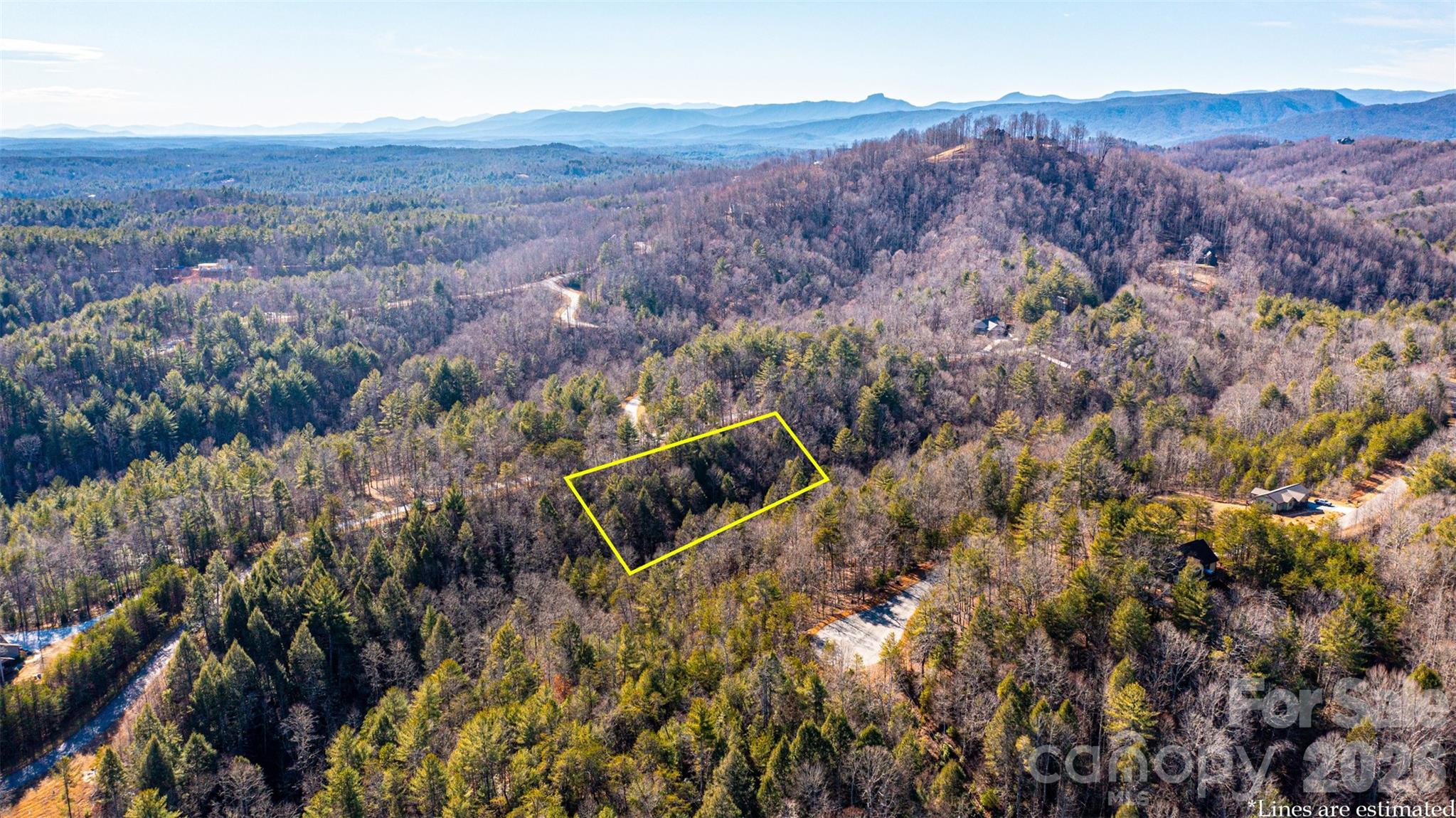 Dreaming of true mountain living?  Welcome to The Coves Mountain River Club, where your dream home begins on this beautiful 1.87-acre homesite nestled in the heart of the Blue Ridge Mountains.
This one-of-a-kind community offers an unmatched lifestyle, featuring Evelyn’s Vineyard, the scenic Round Mountain Ranch equestrian center, and over five miles of the Johns River—perfect for floating, fishing, or simply unwinding. Enjoy exceptional amenities at Pisgah Mountain Lodge, including a pool, fitness center, and inviting fire pit for gathering under the stars. With over 20 miles of trails, adventure is always at your doorstep—whether it’s horseback riding, hiking, or ATV exploring.
Take in breathtaking mountain views while still enjoying convenient access to Morganton, Blowing Rock, Banner Elk, and the scenic Blue Ridge Parkway.  This isn’t just land… it’s a lifestyle.
Come build your story in a community designed for those who truly love the mountains.