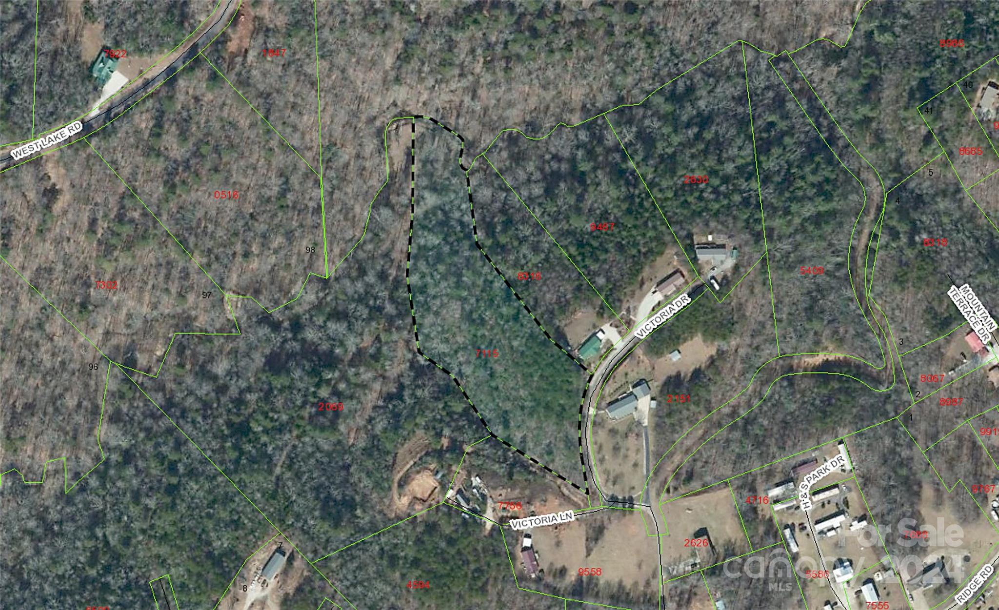 Nice buildable lot outside city limits. This 4.76 acre parcel sits at the end of the road with paved frontage. With some clearing you could have a perfect building spot for your home with minimal restrictions and lots of privacy. Call today for your showing!