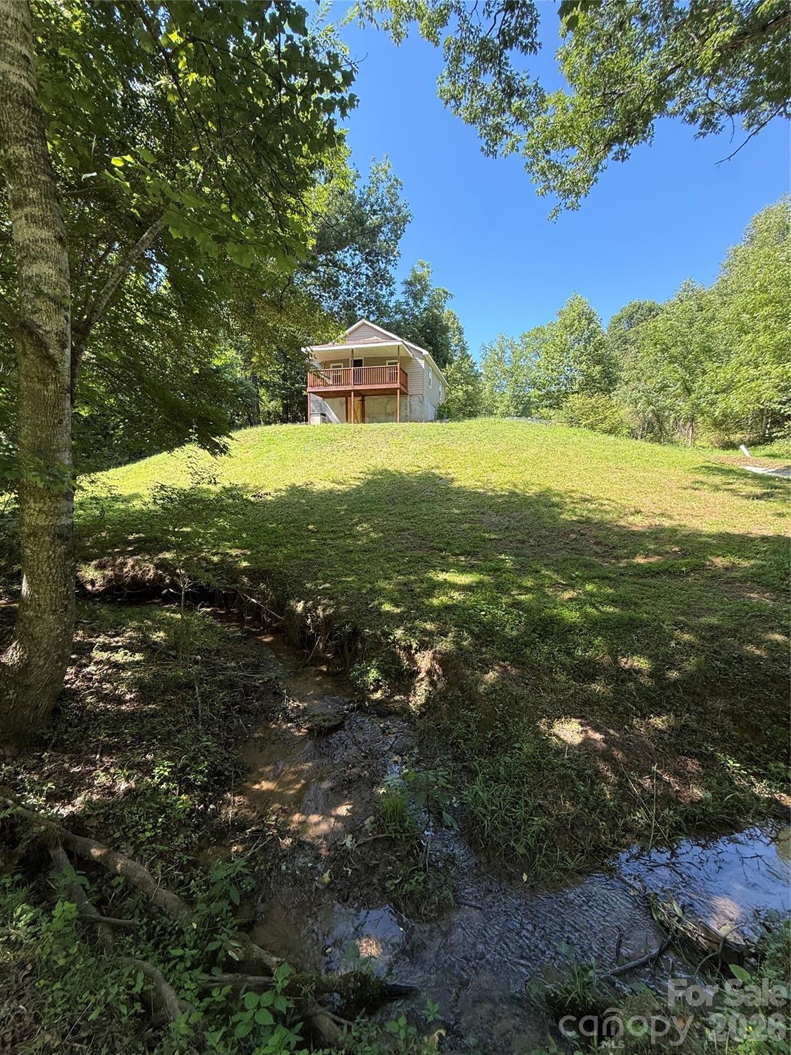 Welcome home to this newly remodeled 2-bedroom, 1-bath home, conveniently located just off Creekway Drive in Lenoir! Situated on approximately 0.65 acres, this charming property offers the perfect blend of updates and peaceful outdoor living.

Step inside to find a completely renovated interior that’s move-in ready, while outside you’ll enjoy a spacious deck just off the kitchen overlooking a small stream that runs along the front of the property—an ideal spot for your morning coffee or relaxing evenings.

Whether you’re a first-time homebuyer, looking to downsize, or searching for an investment opportunity, this home is a fantastic choice. Don’t miss your chance to own this adorable property in a convenient location!