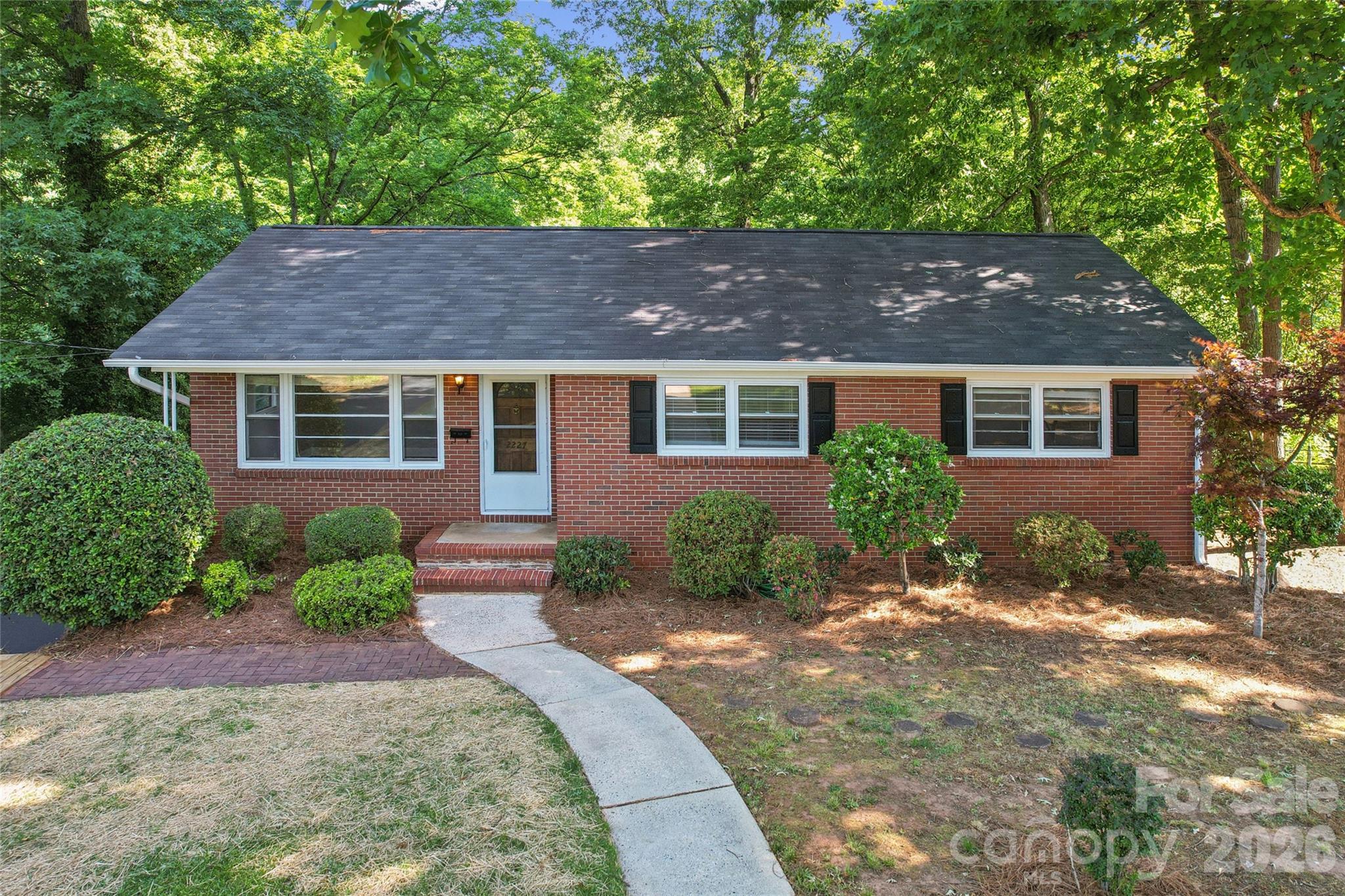 Price reduction!! Great income generating investment OR accessible price into a move in ready Montclaire home OR get in and make it your own with modern remodel and updates! Brick ranch with finished walkout lower level on a rare incredibly large, private lot in one of South Charlotte’s most desirable neighborhoods, with no HOA. Experience the best of both worlds: a park-like setting with the privacy of a deep-wooded lot, while remaining close to the action of all the dining, entertainment, shops, and retail you could want. Totally refreshed inside and out with new landscaping, fresh paint, updated fixtures and finishes, new patio slider, and much more - ready for its next owner or tenant. Oversized kitchen with granite countertops, stainless appliances and adjoining dining space.  Walkng out onto your deck and take in the breathtaking tranquil backyard retreat. Beautiful original hardwood floors grace the living room, hall, and three bedrooms. Head downstairs to the walkout lower level where a large finished space, laun dry room, and room for more expansion awaits. 

Located a few blocks off Park Rd minutes away from everything Southpark has to offer but tucked deep into the neighborhood. Little Sugar Creek Greenway access just 1,000 feet away; Less than three miles from Montford and Park Rd Shopping Center, six miles to South End, and under seven miles to the heart of Uptown. Want to take the train – Lynx Blue line is less than 2 miles away. Driving somewhere - minutes to I-77.