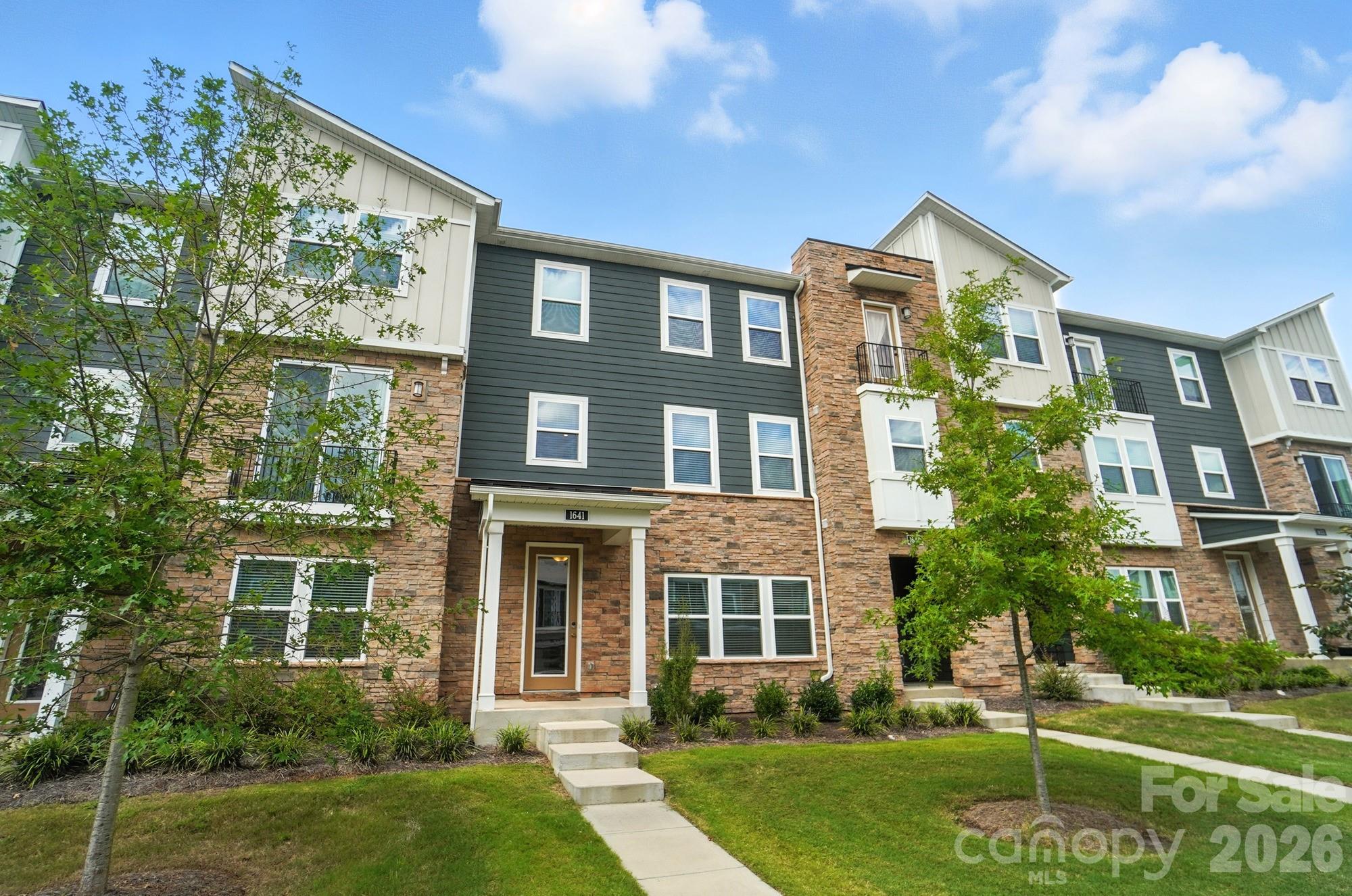 Why wait for new construction when you can move in NOW?

This practically brand-new, three-story townhome is located in a gorgeous community complete with an outdoor pool and scenic walking trails. Designed for modern living and effortless entertaining, this home offers a thoughtful layout across every level:

Main Floor: Features a private bedroom and full bath—perfect for guests or a home office—plus a convenient drop zone just inside the 2-car back-load garage.

Second Floor: An open-concept entertainer’s dream! The gourmet kitchen and dining area flow seamlessly into the family room and out onto a large front deck.

Third Floor: Retreat to the expansive primary suite, two additional bedrooms, and a large loft area that is unique to this specific floor plan. A dedicated laundry room and a well-sized secondary bath complete the upper level.

Move-in ready and full of high-end finishes, this is the one you’ve been waiting for!