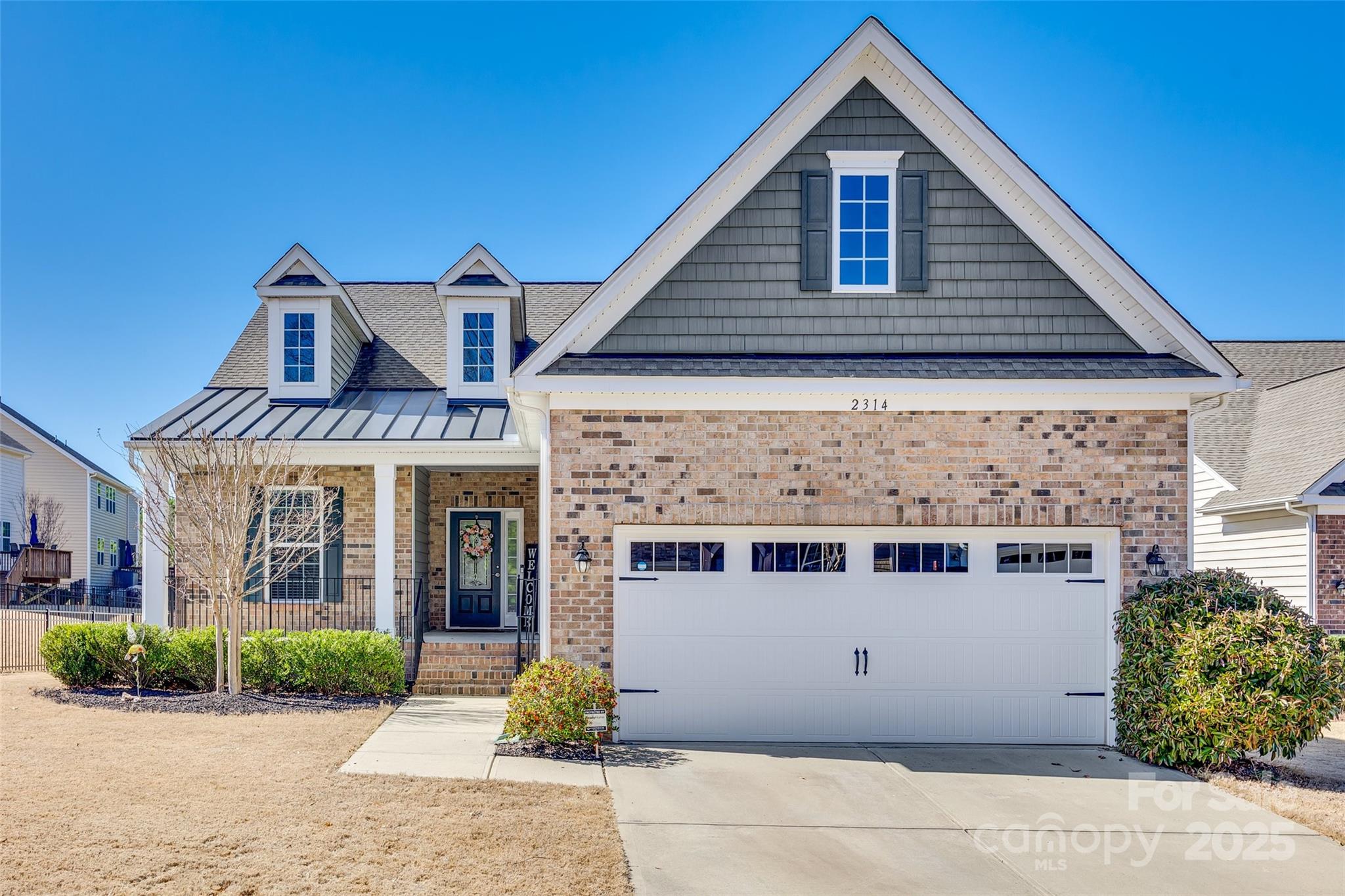 You won’t want to miss this charming home nestled in the highly sought-after community of Waterside at Catawba. This beautifully designed home boasts an open floor plan and a stunning upgraded gourmet kitchen.

As you step through the front door, you’ll be welcomed by a spacious foyer leading to a guest room, a full bathroom, and a private office with elegant French doors. The main level also features a large eat-in kitchen and a luxurious primary suite with a generous walk-in closet, dual vanities, and a walk-in shower.

Upstairs, you'll find an additional spacious bedroom, a full bathroom, and a versatile bonus room with a closet—perfect for a media room, playroom, or additional guest space.

Enjoy your mornings with a cup of coffee on the large front porch or relax on the fully screened-in back porch, which leads to an expansive paver-stone patio complete with a built-in grill. The backyard offers a serene wooded view, creating the perfect private retreat.