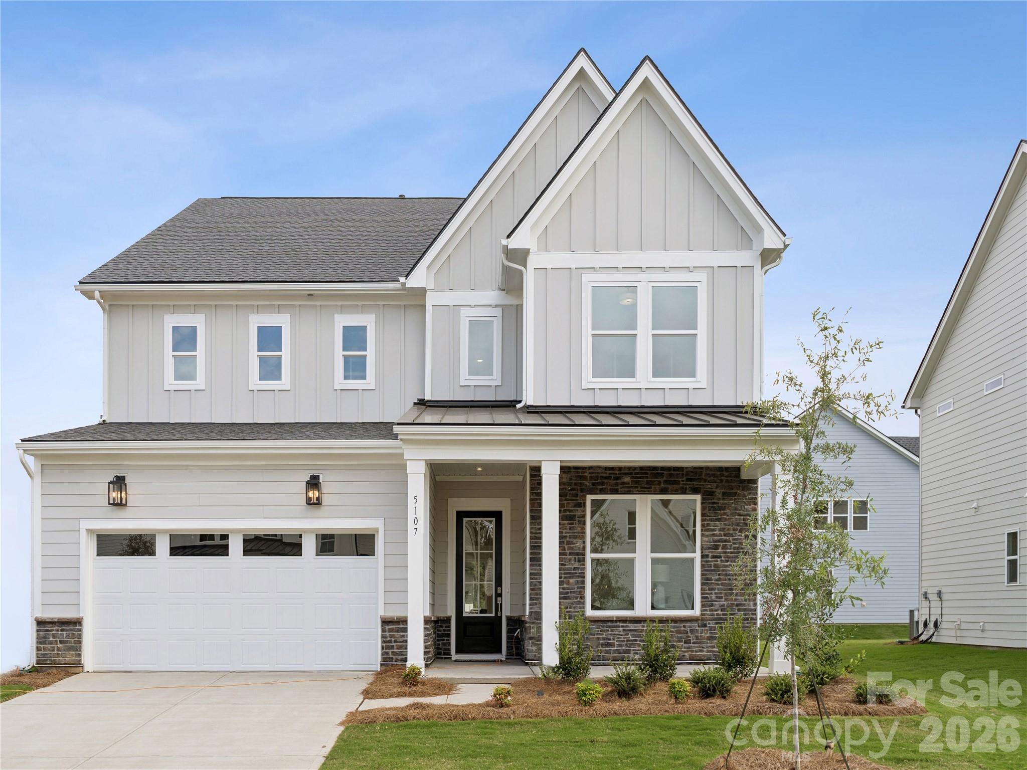 Introducing a truly one-of-a-kind residence in Griffith Lakes—originally crafted as a showcase home for our newest luxury community. Every detail has been thoughtfully curated and impeccably finished, offering a rare chance to own the only gallery home of its kind in our community. This is an unparalleled opportunity to secure a model-caliber residence in one of Charlotte’s most sought-after new neighborhoods.

Discover inspired living in The Wilburn, a stunning 5-bedroom, 5.5-bath home expertly crafted for both elegance and everyday comfort. Thoughtfully designed with versatility in mind, this residence features a formal dining room, flex room, and an airy loft, offering ample space for entertaining, working, and relaxing.

The grand two-story foyer sets an impressive tone upon entry, while 10' ceilings and 8' doors on the first floor create an open, sophisticated atmosphere throughout the main level. The gourmet kitchen is a true showpiece, showcasing a striking dolomite countertop on the extended island, premium KitchenAid appliances, and a beautifully appointed butler’s pantry—perfect for hosting and culinary creativity.

A desirable first-floor ensuite guest bedroom provides comfort and privacy for visitors. Upstairs, the luxurious primary suite features dual walk-in closets and a spa-inspired bath, offering a serene retreat at the end of the day. Each additional bedroom includes its own walk-in closet and private bathroom, delivering exceptional convenience and personalization for every member of the household.

Blending contemporary style with functional design, The Wilburn offers unmatched comfort, impressive architectural details, and abundant storage—all in a layout tailored for modern living.

And that’s not all—future resort-style amenities are projected for completion in 2026, including a clubhouse, fitness center, outdoor pool with cabanas, hot tub, pickleball & tennis courts, grilling areas, and cozy firepits. This community is crafted for elevated living and endless enjoyment. This home truly has it all—luxury, convenience, and incredible incentives. Don’t miss your chance to make it yours!